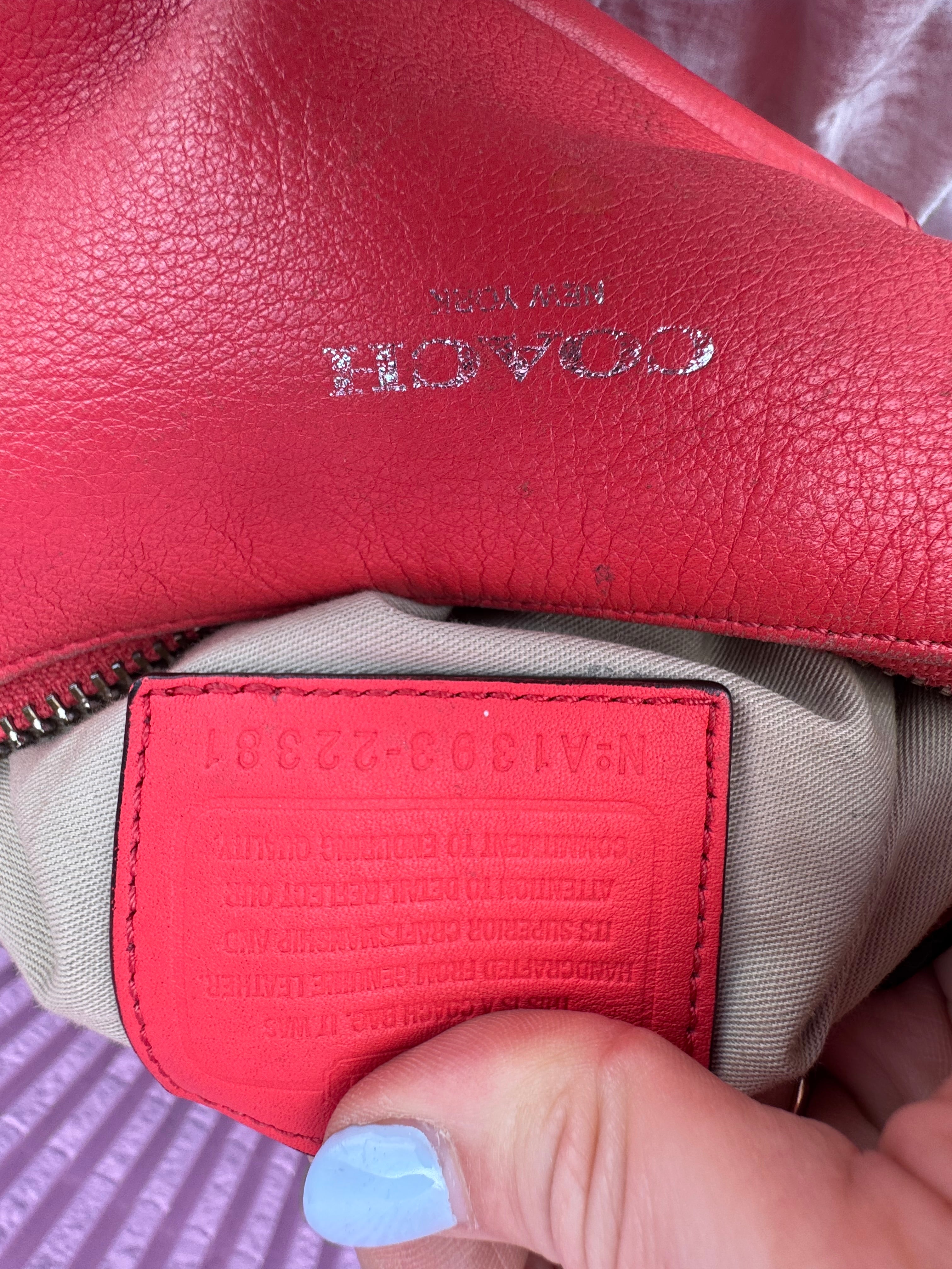 Coral Coach leather purse
