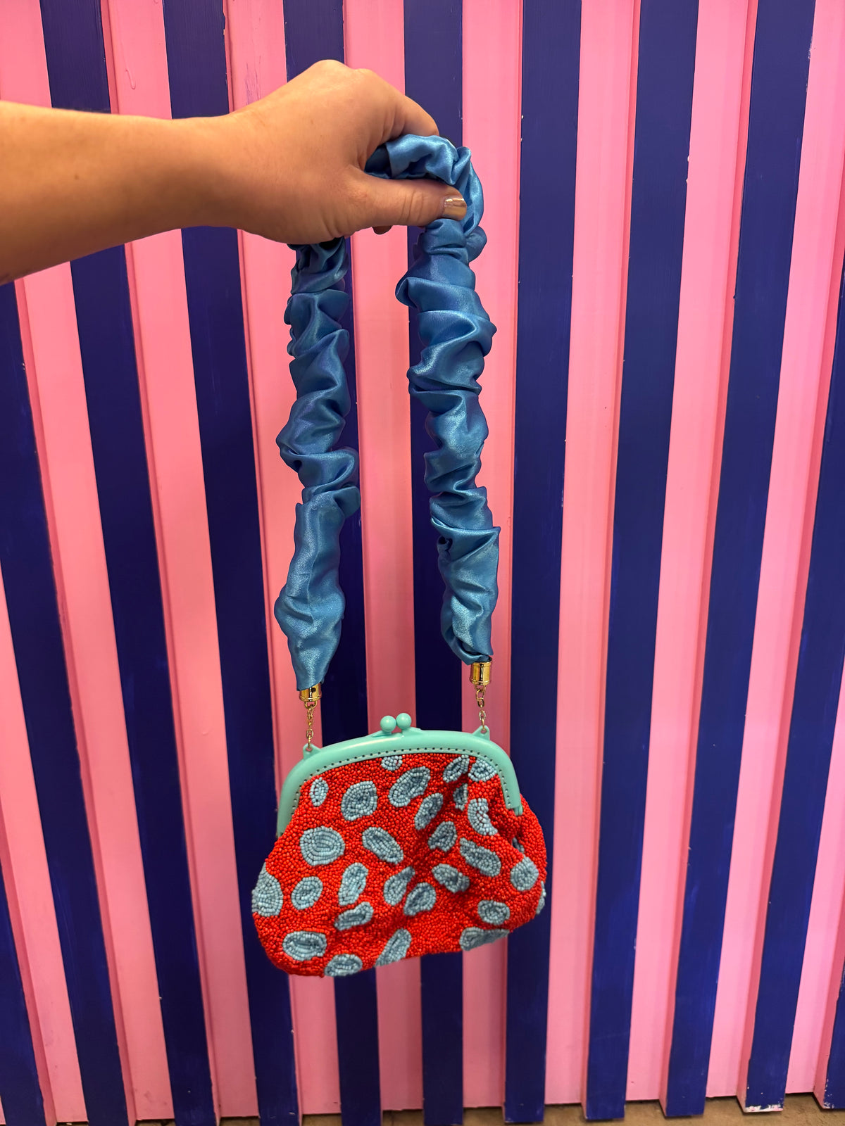 blue red brunna co beaded bag