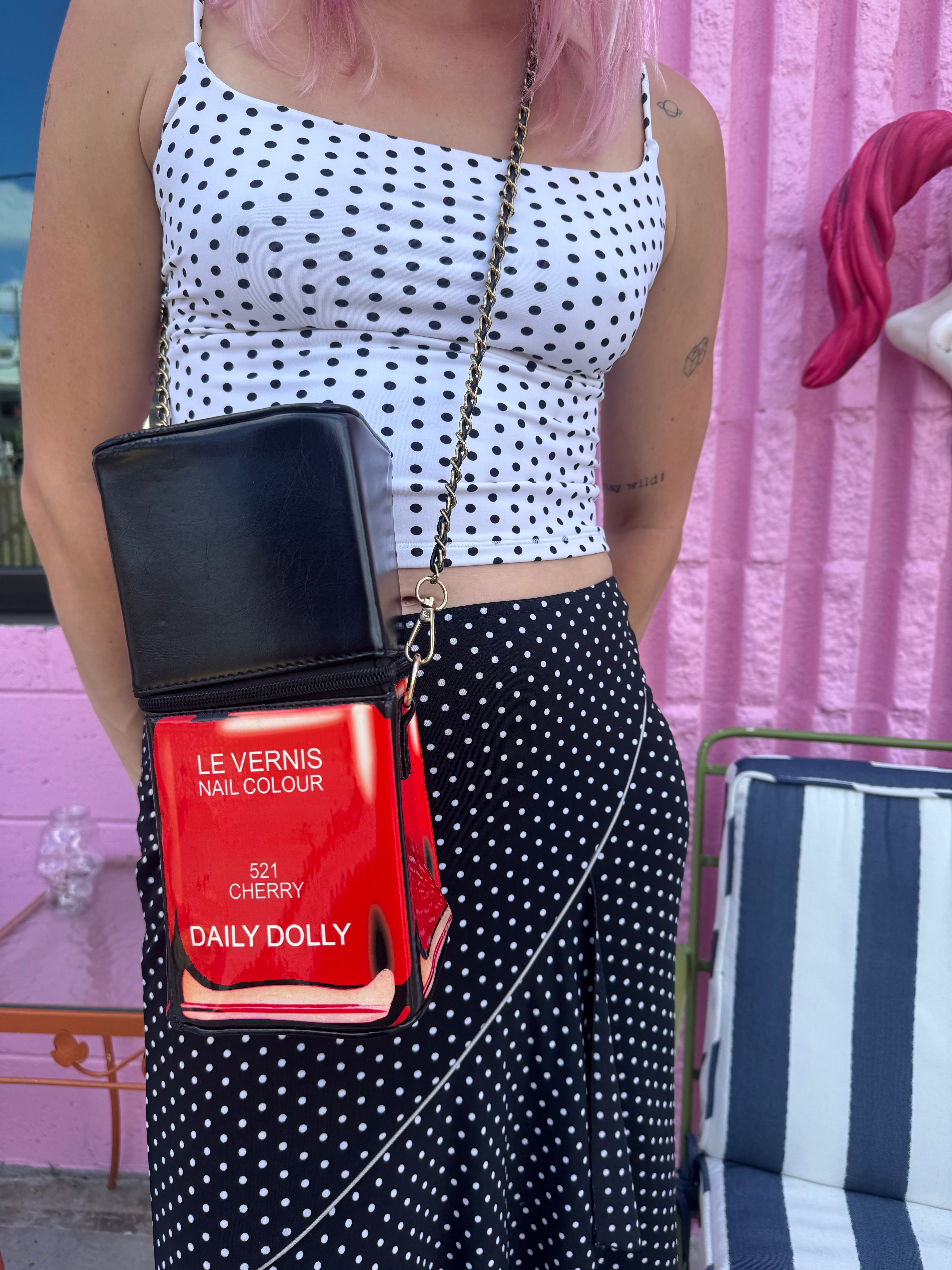 red black nail polish purse