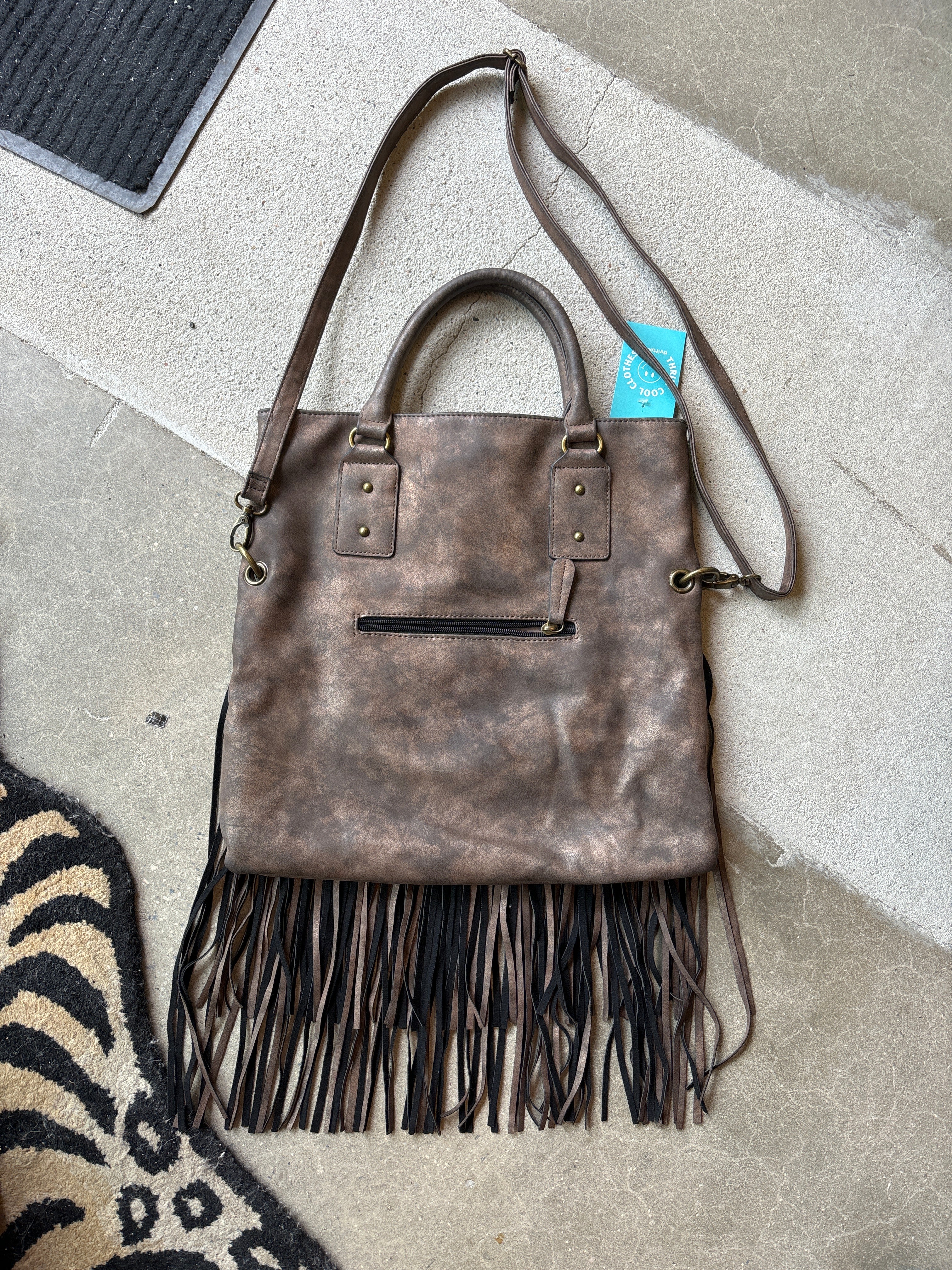 brown fringe leather handbag