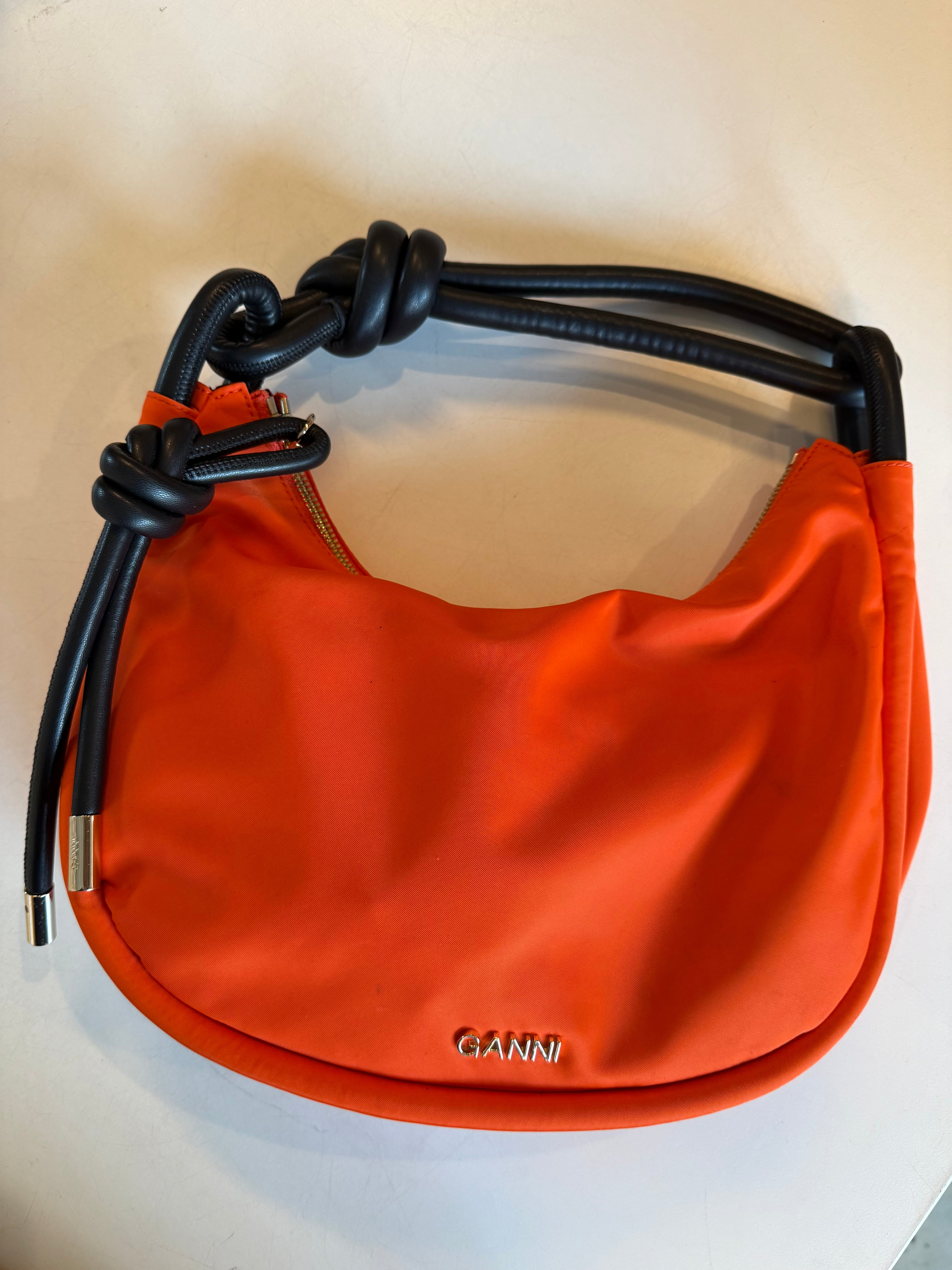 orange ganni crescent tie bag