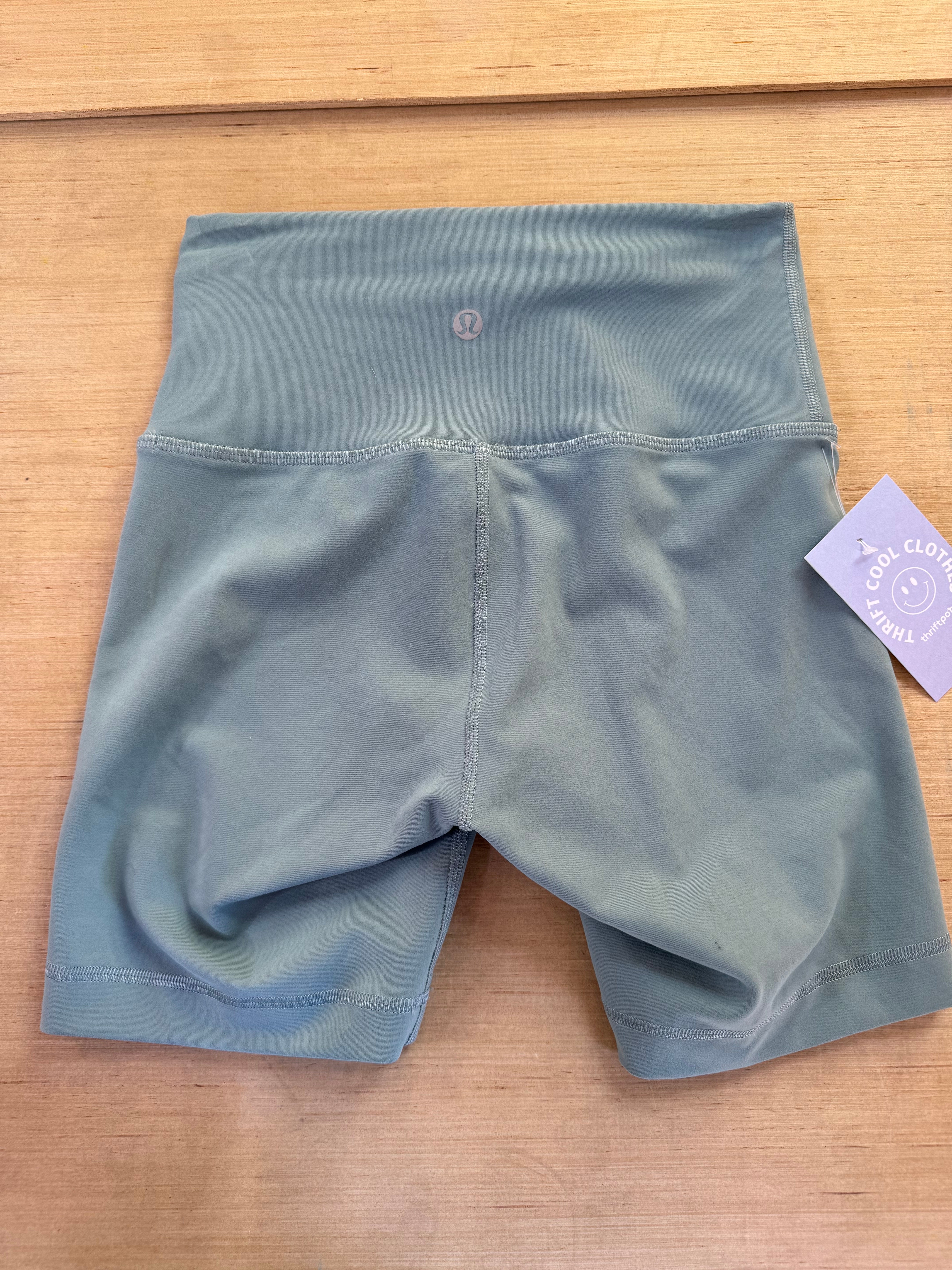 green lululemon athletic biker shorts, 4