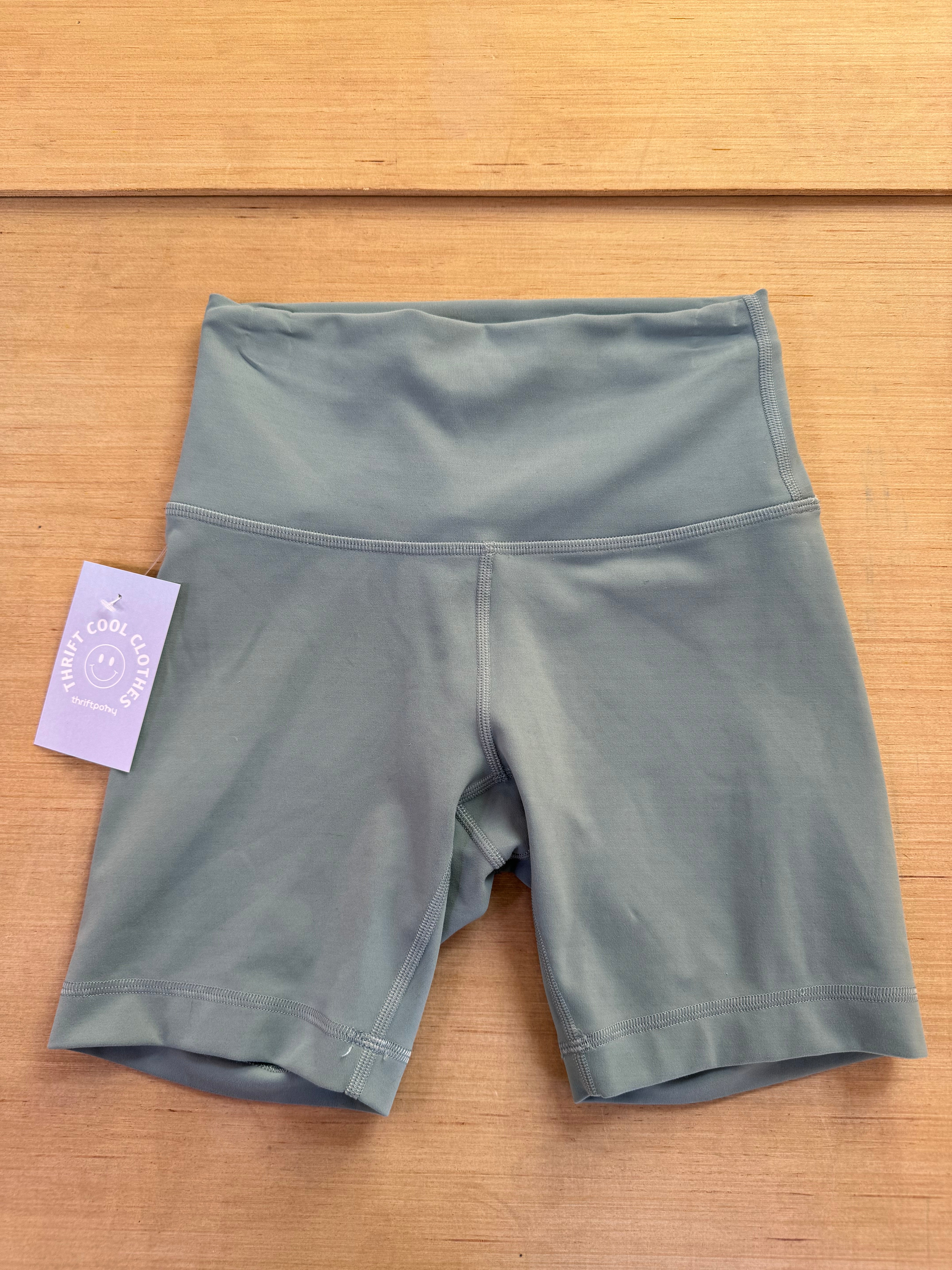 green lululemon athletic biker shorts, 4