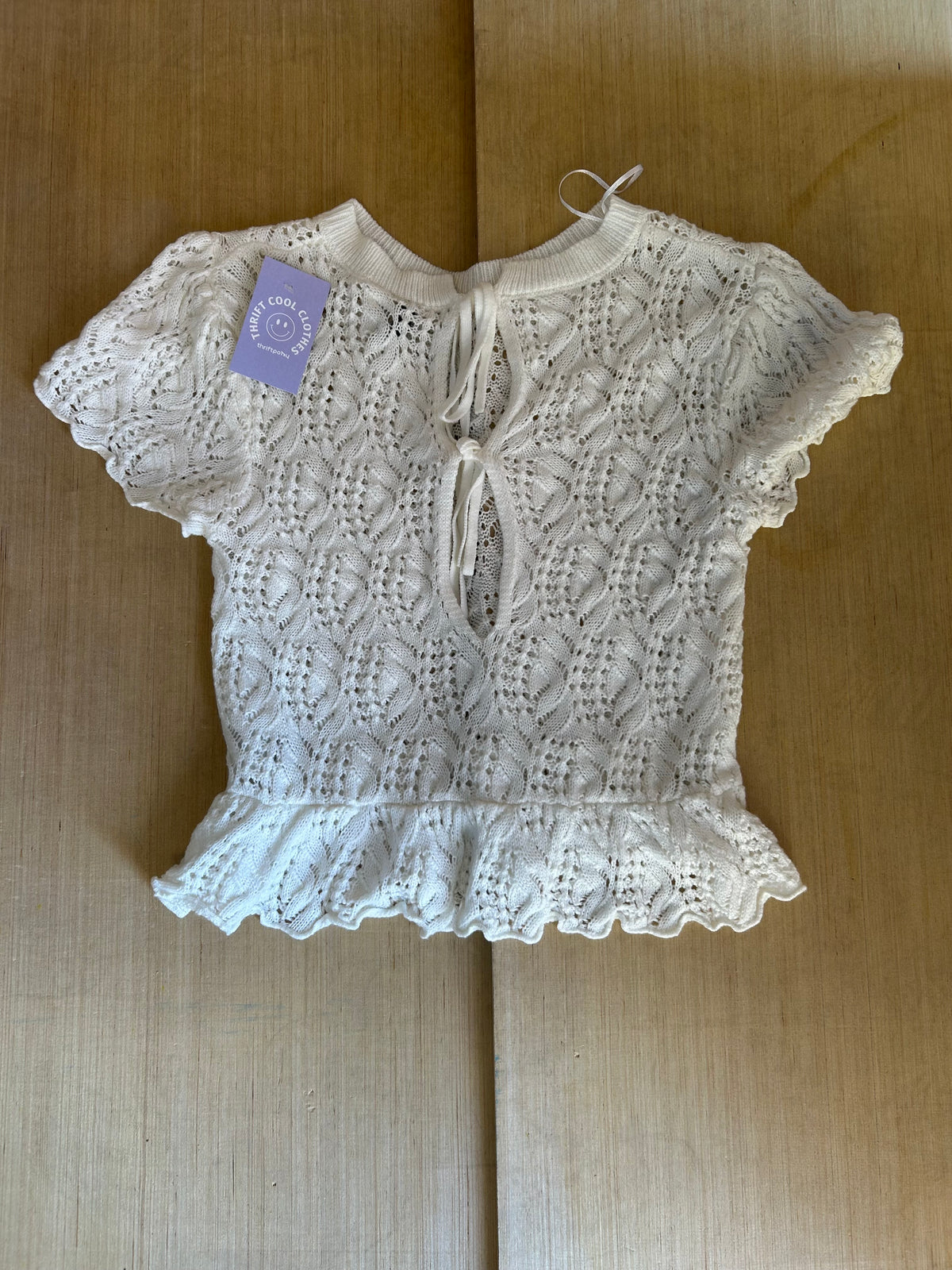 white divided crochet peplum top, m