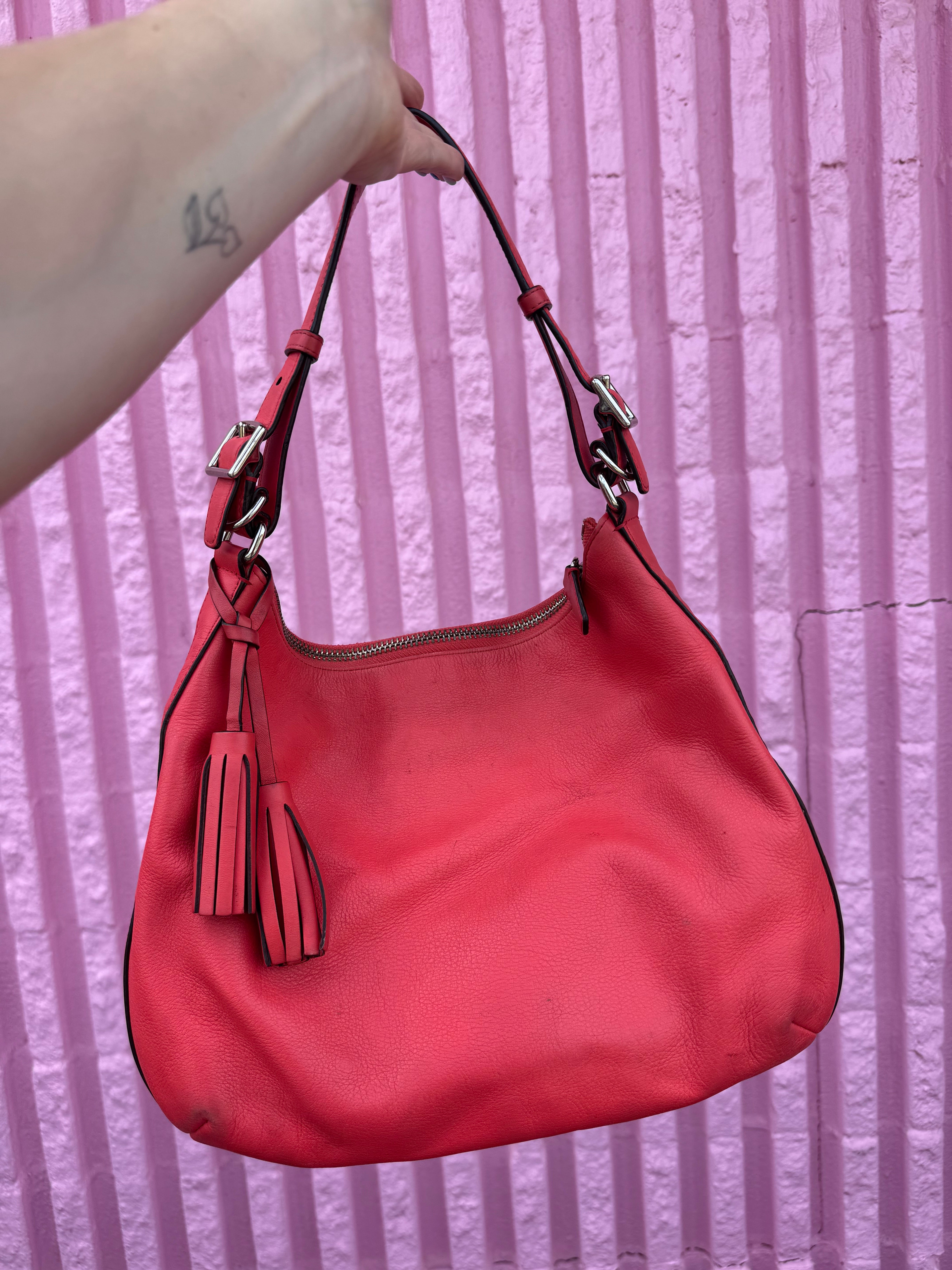 Coral Coach leather purse