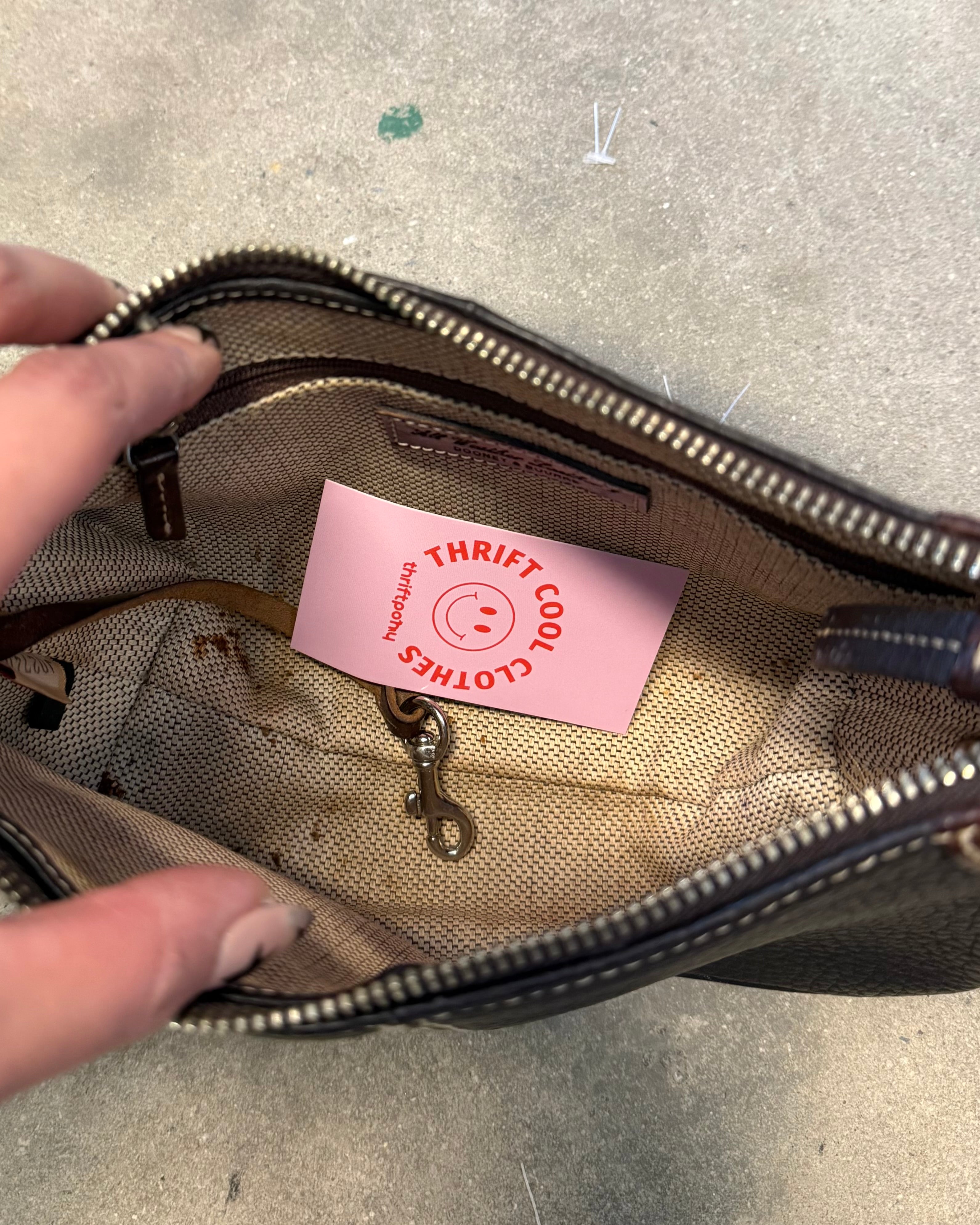 black brown dooney & bourke leather mini purse