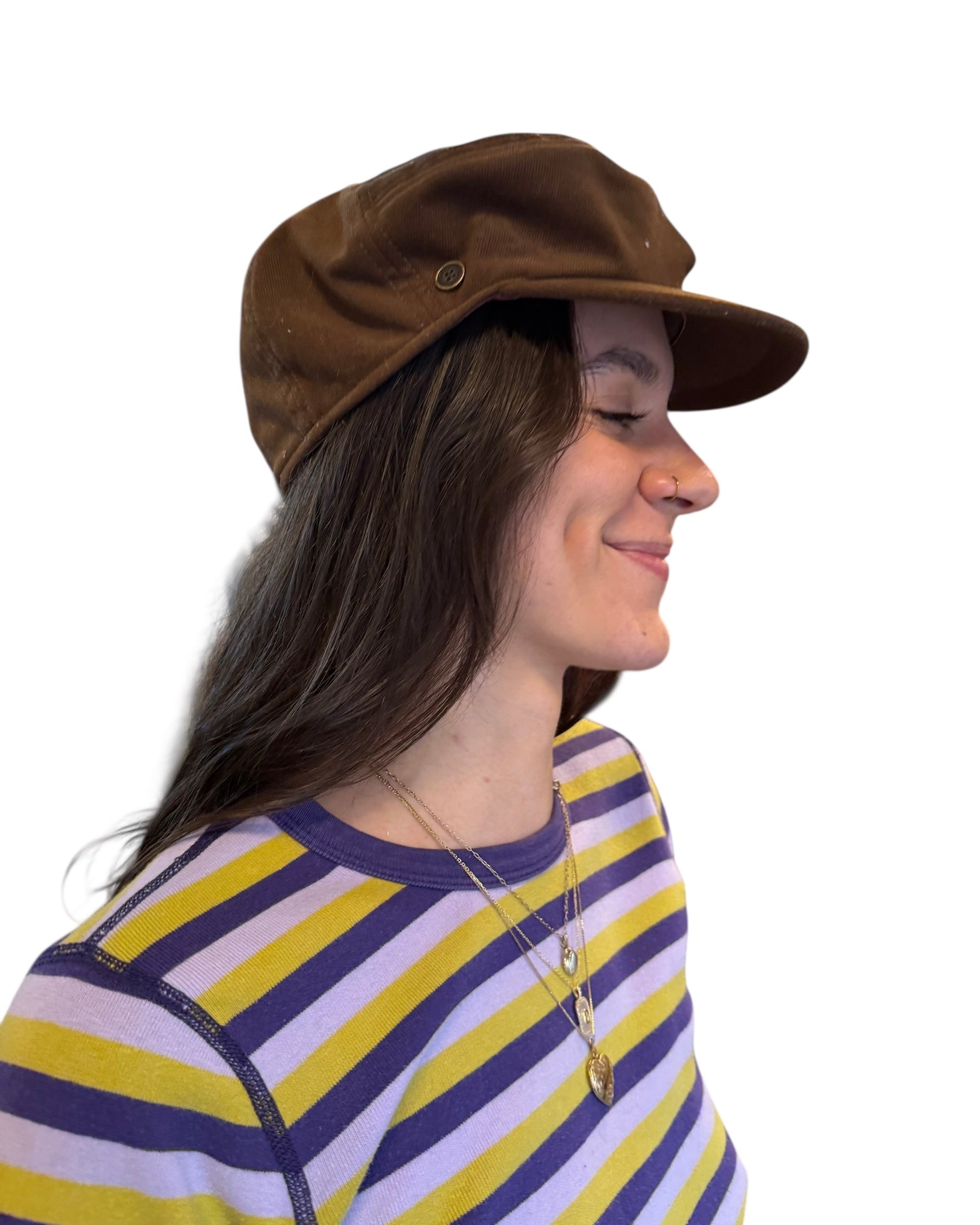 brown fallenbroken street conductor hat