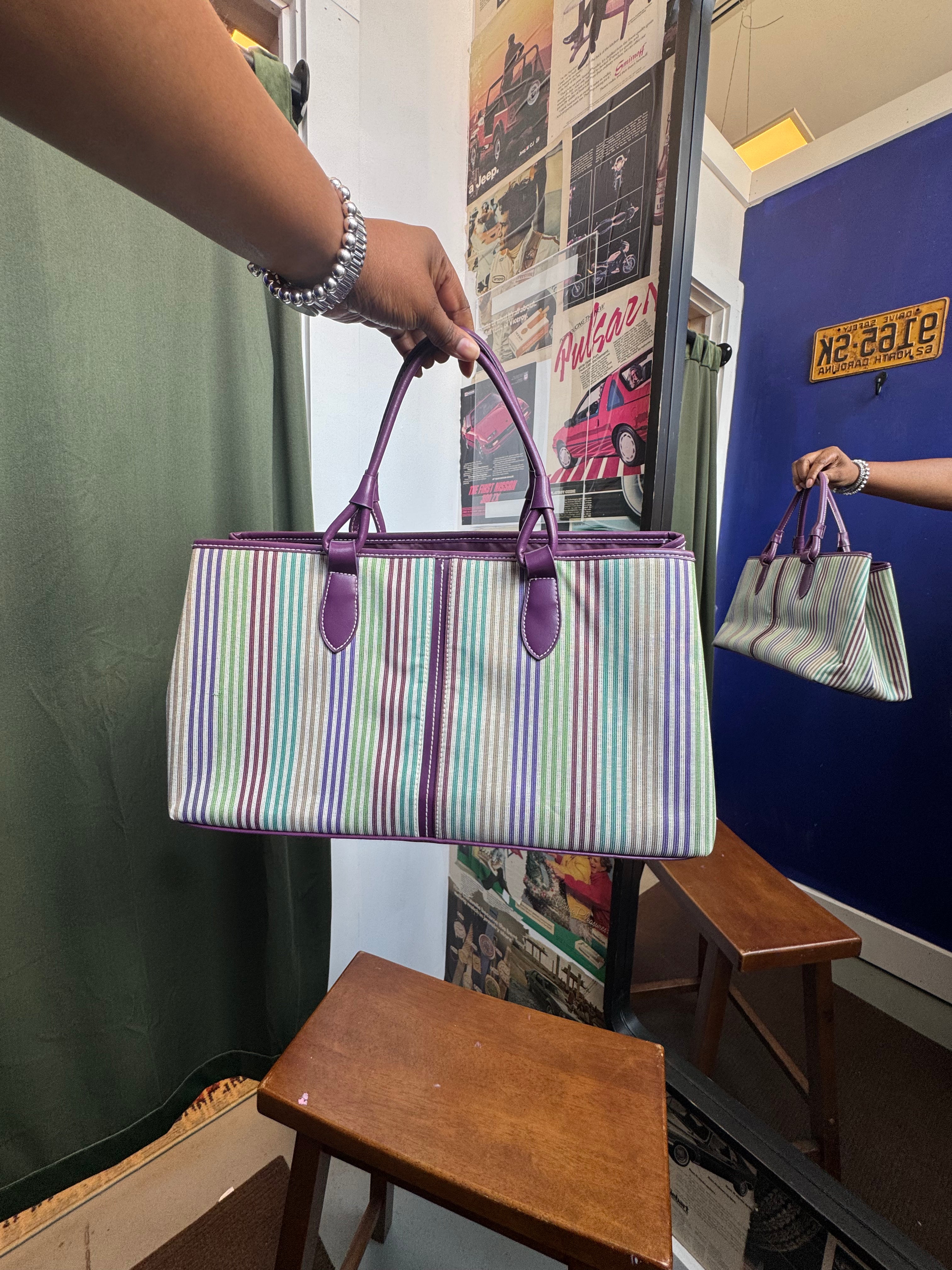 purple multi striped purse and phone holder