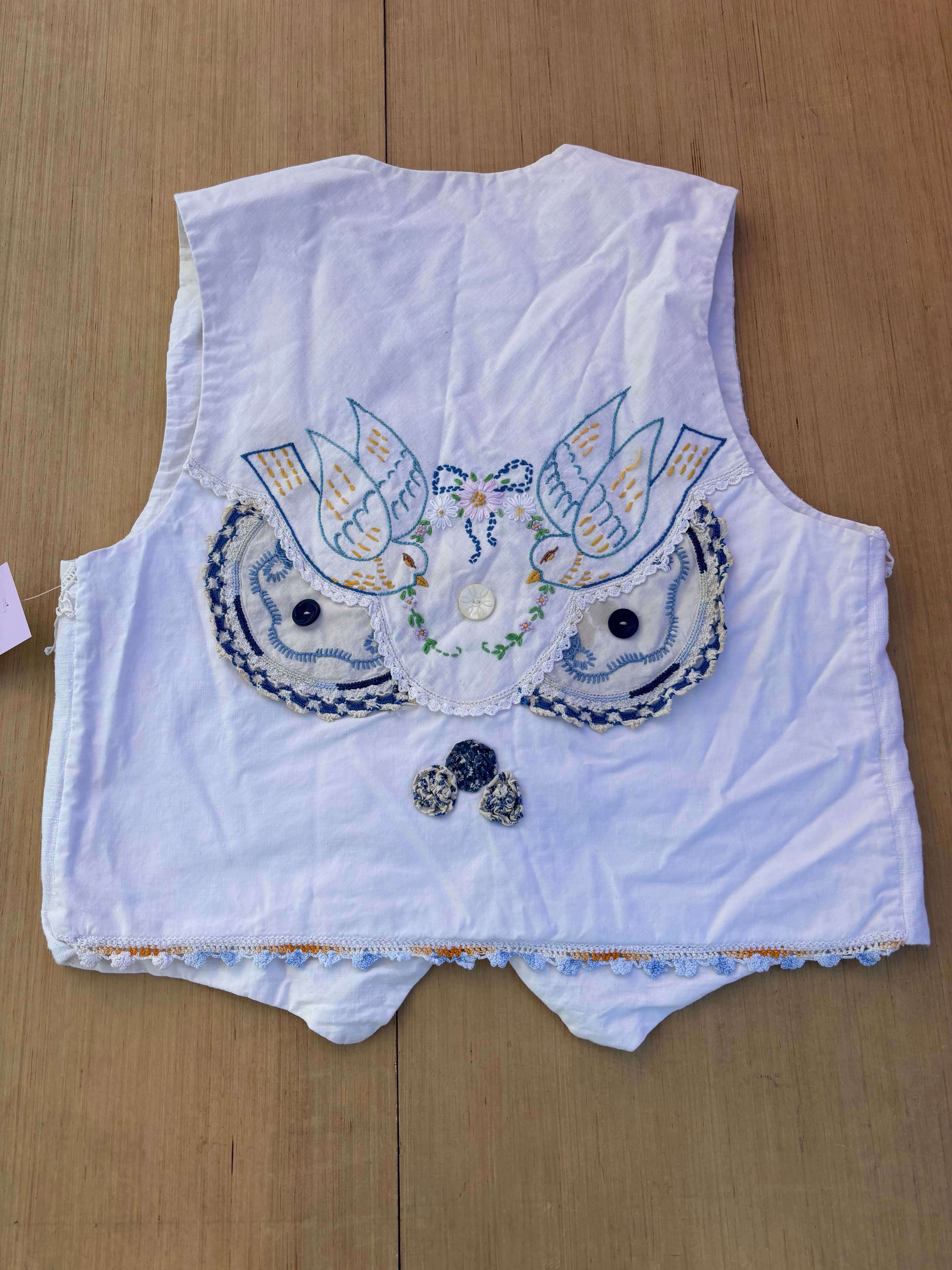 white embroider garden vest