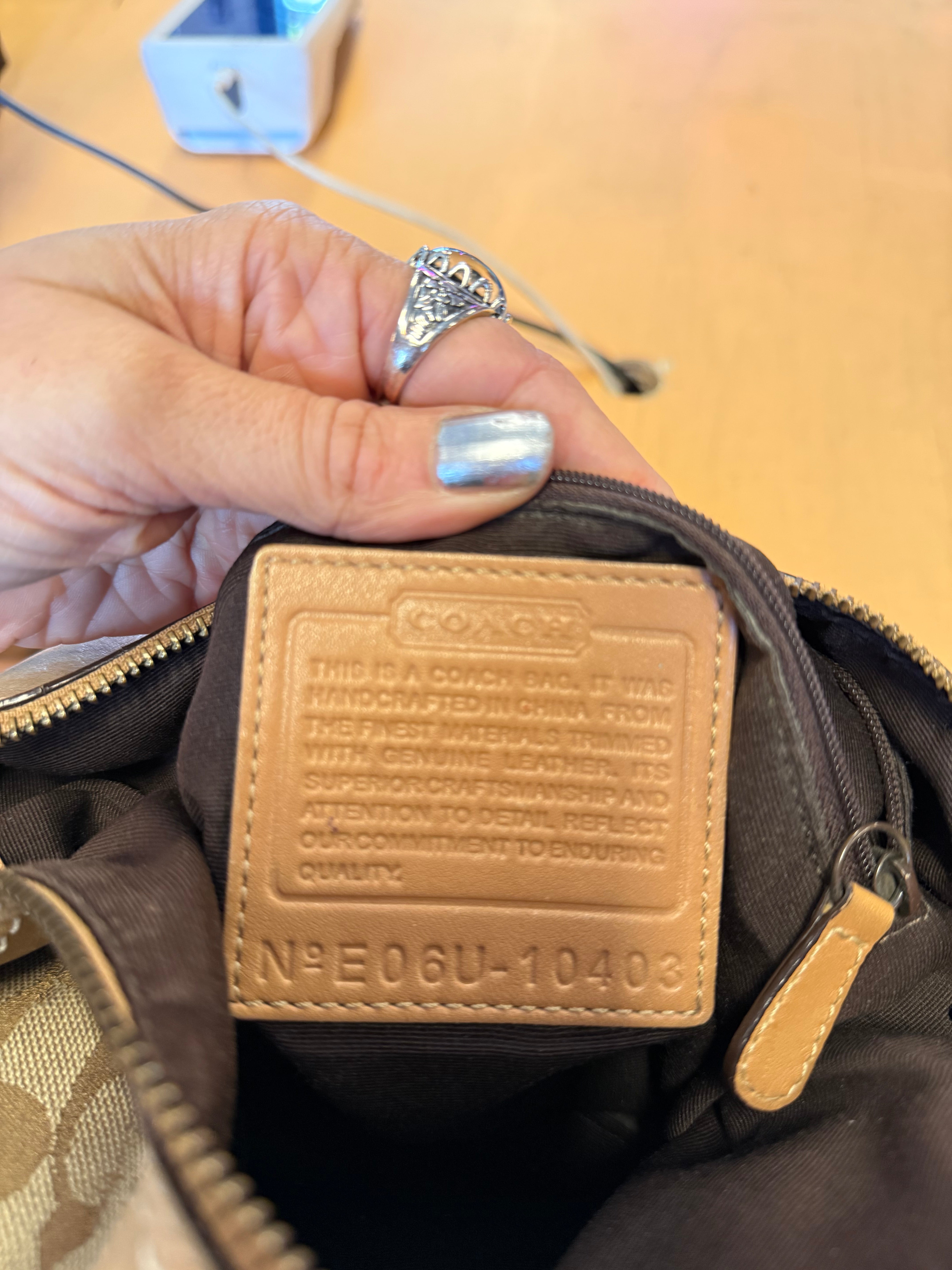 brown coach branded crossbody