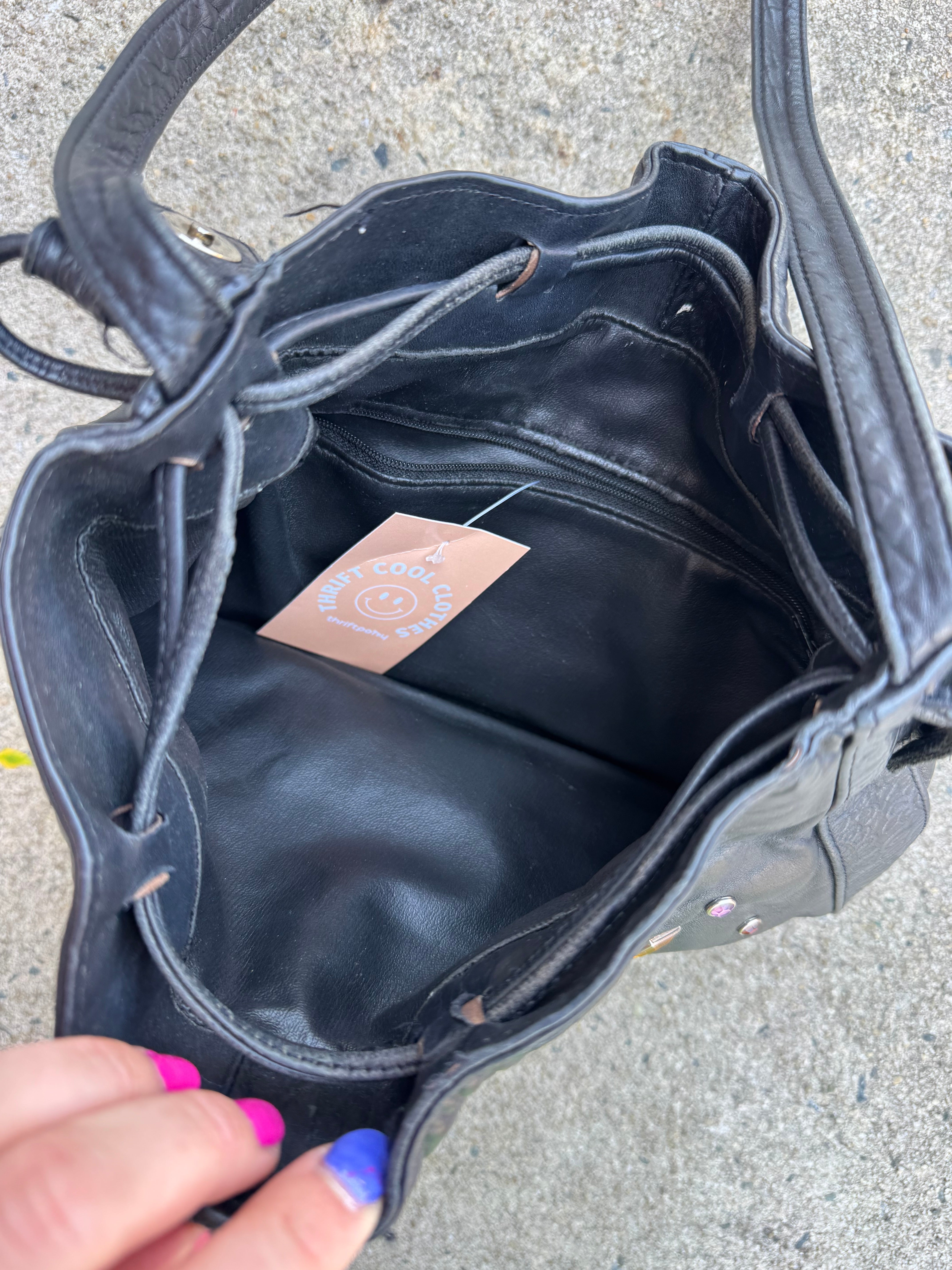 black  bedazzled leather bag