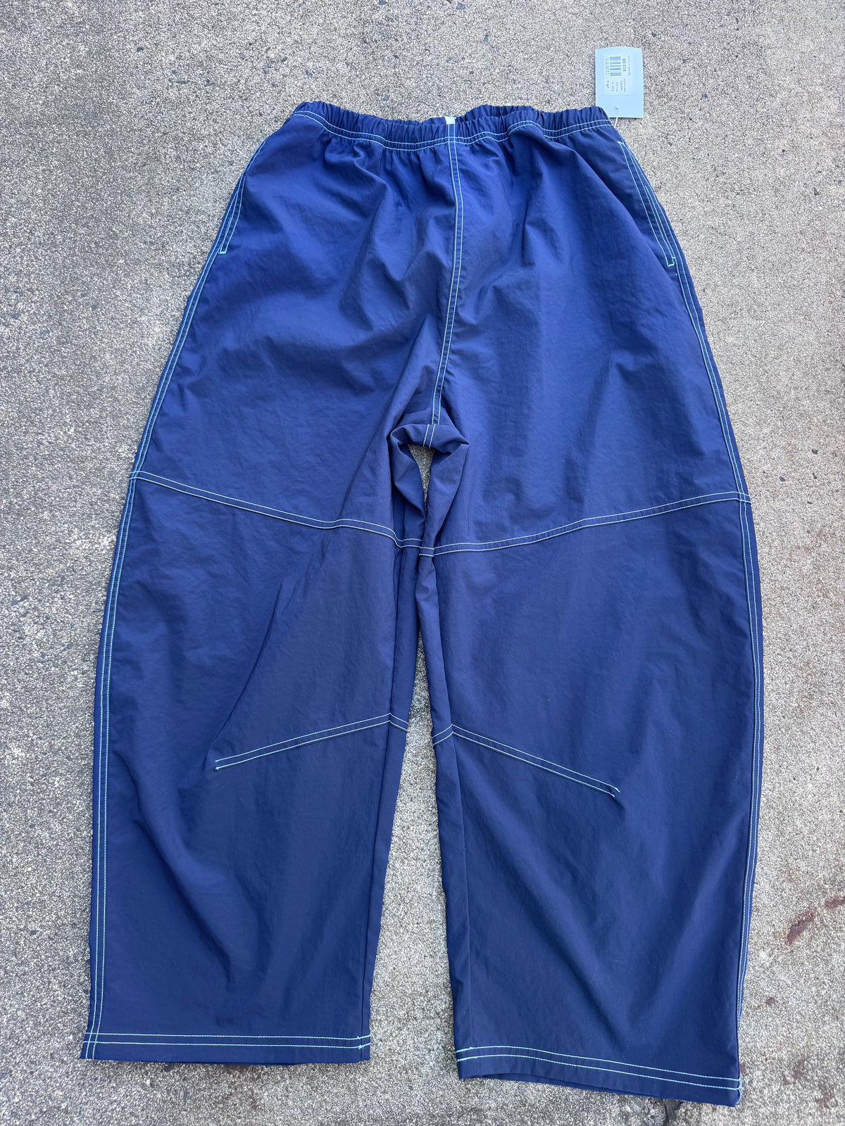 navy blue offline swooshy seam pants, m