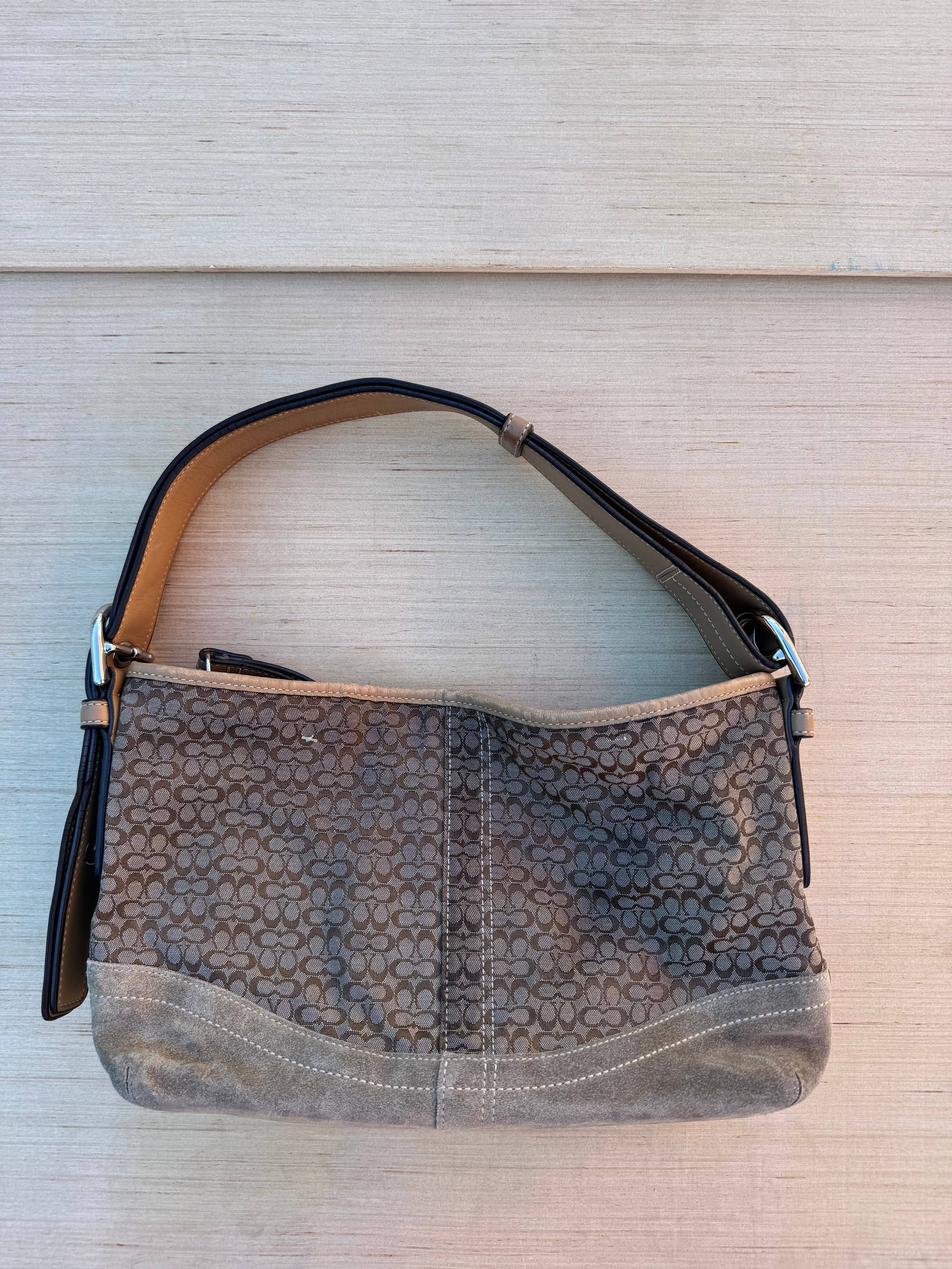 brown coach branded purse