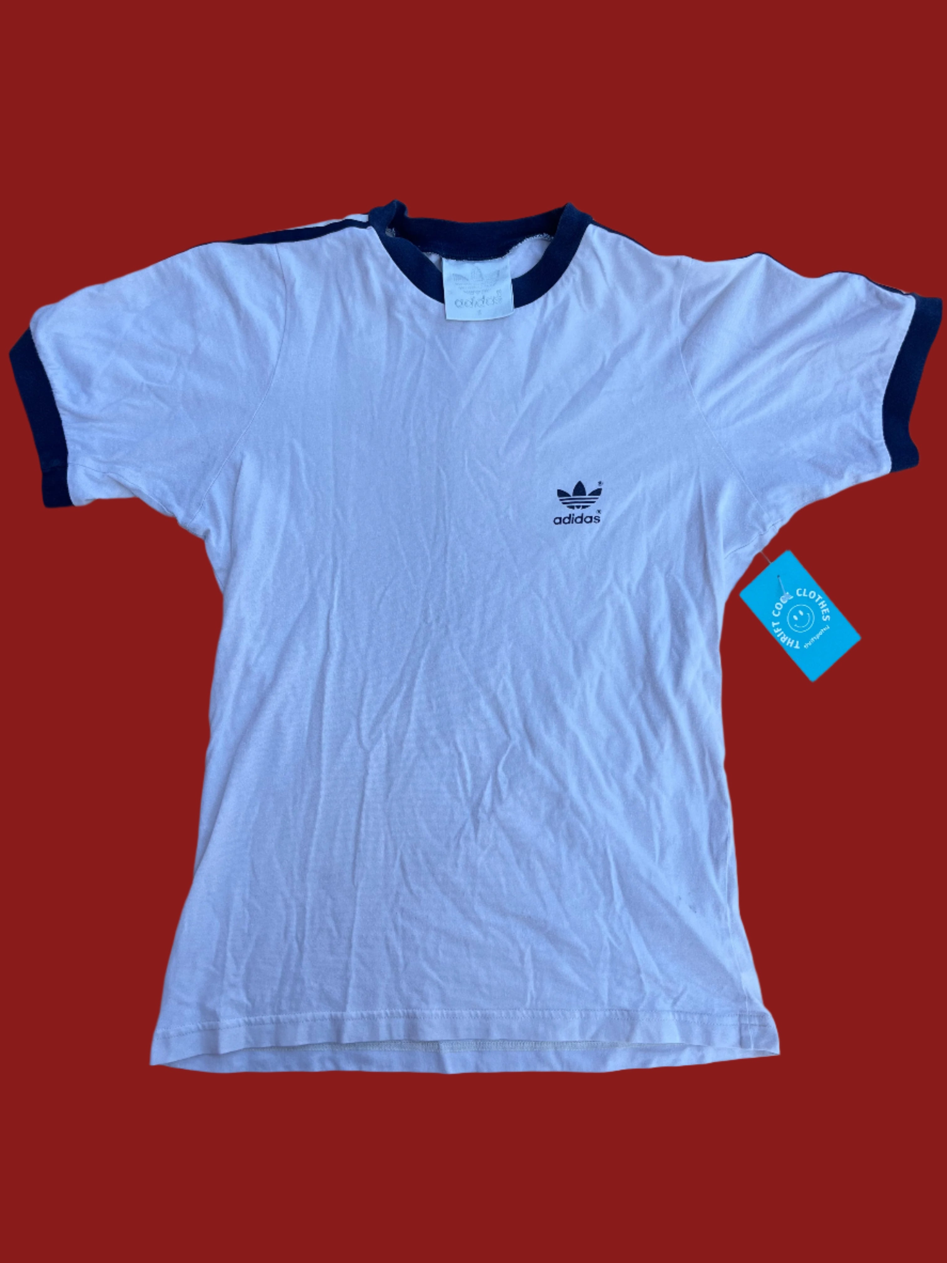 white adidas tee, small