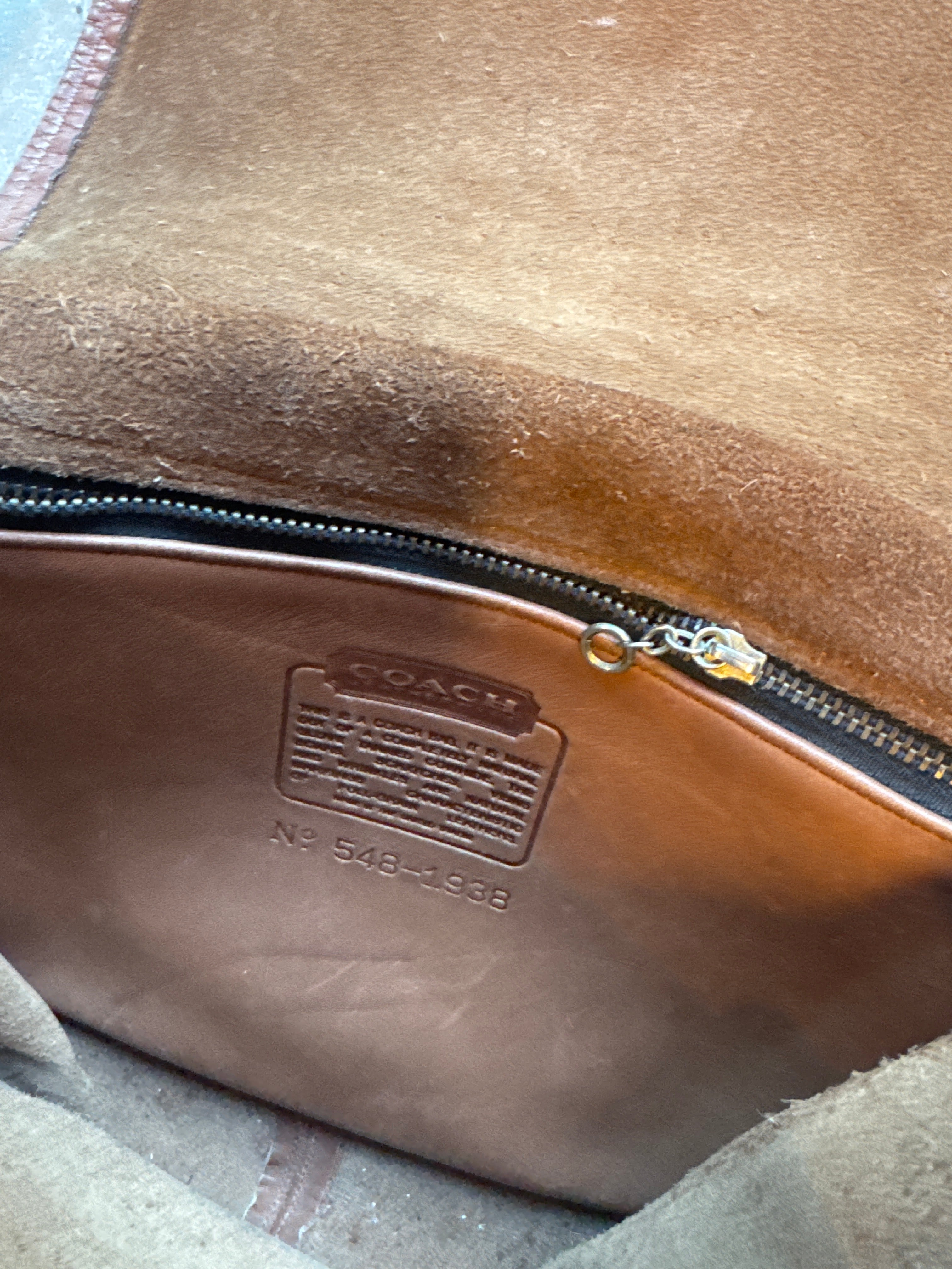 tan coach shoulder bag