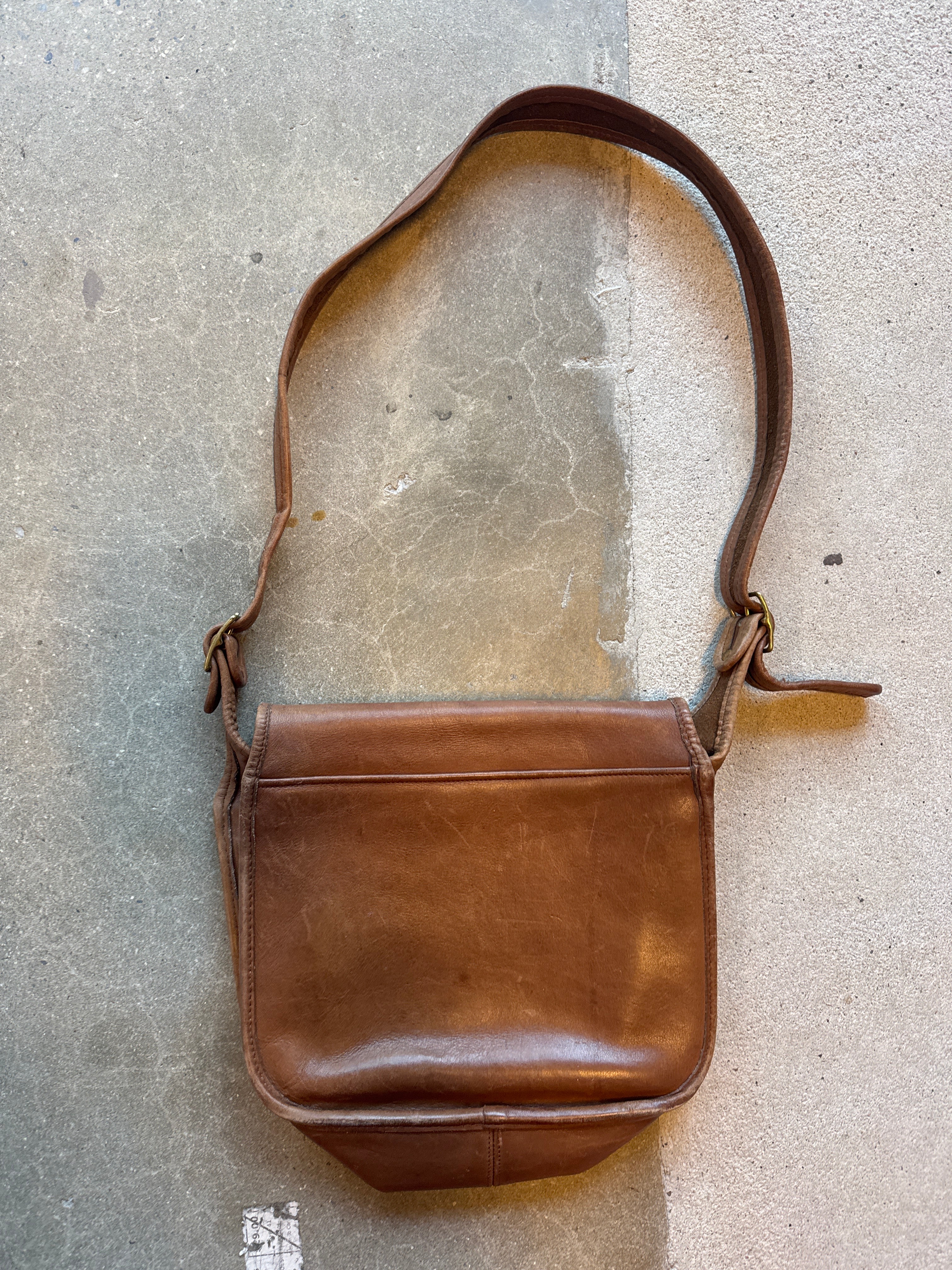 tan coach shoulder bag