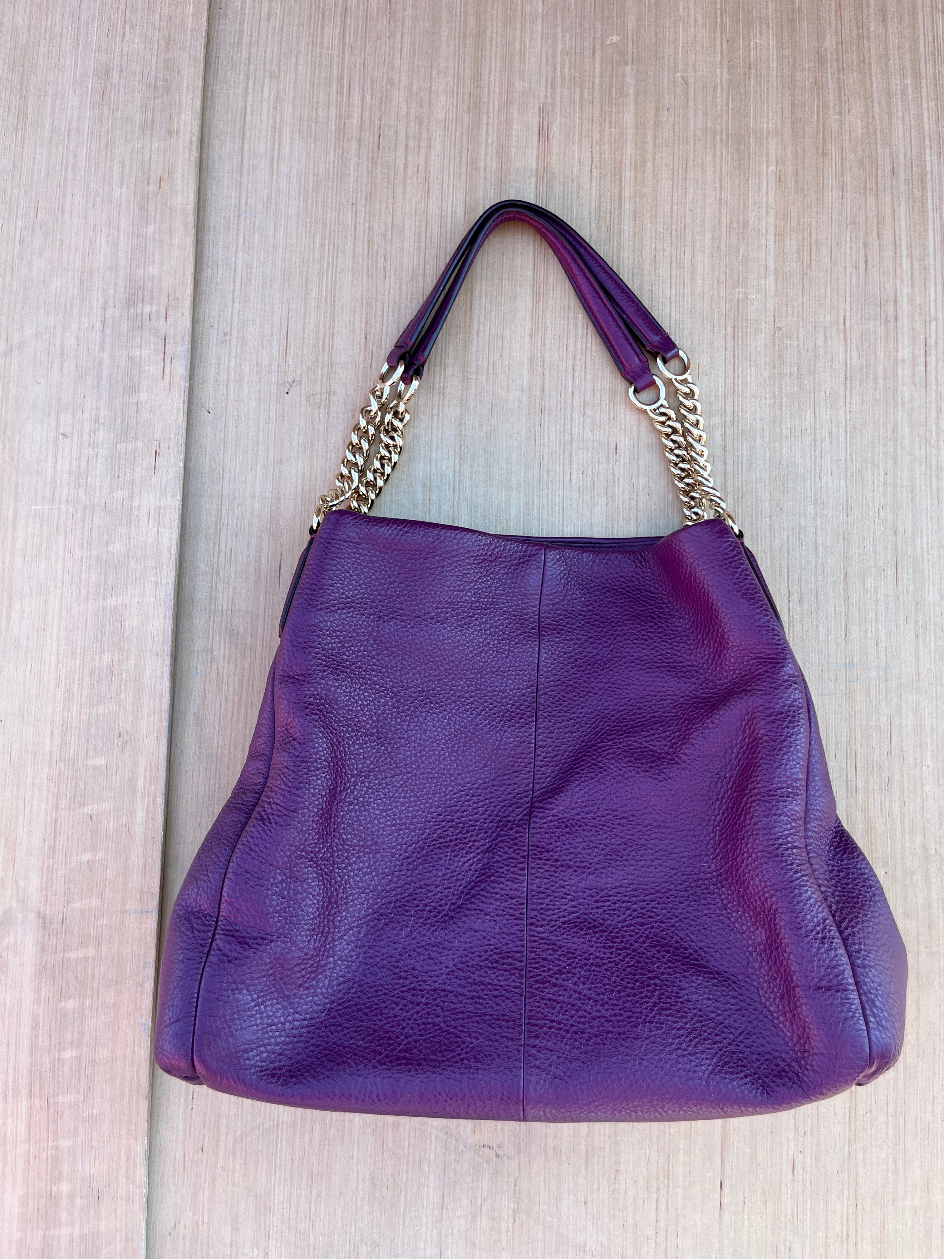 purple coach handbag