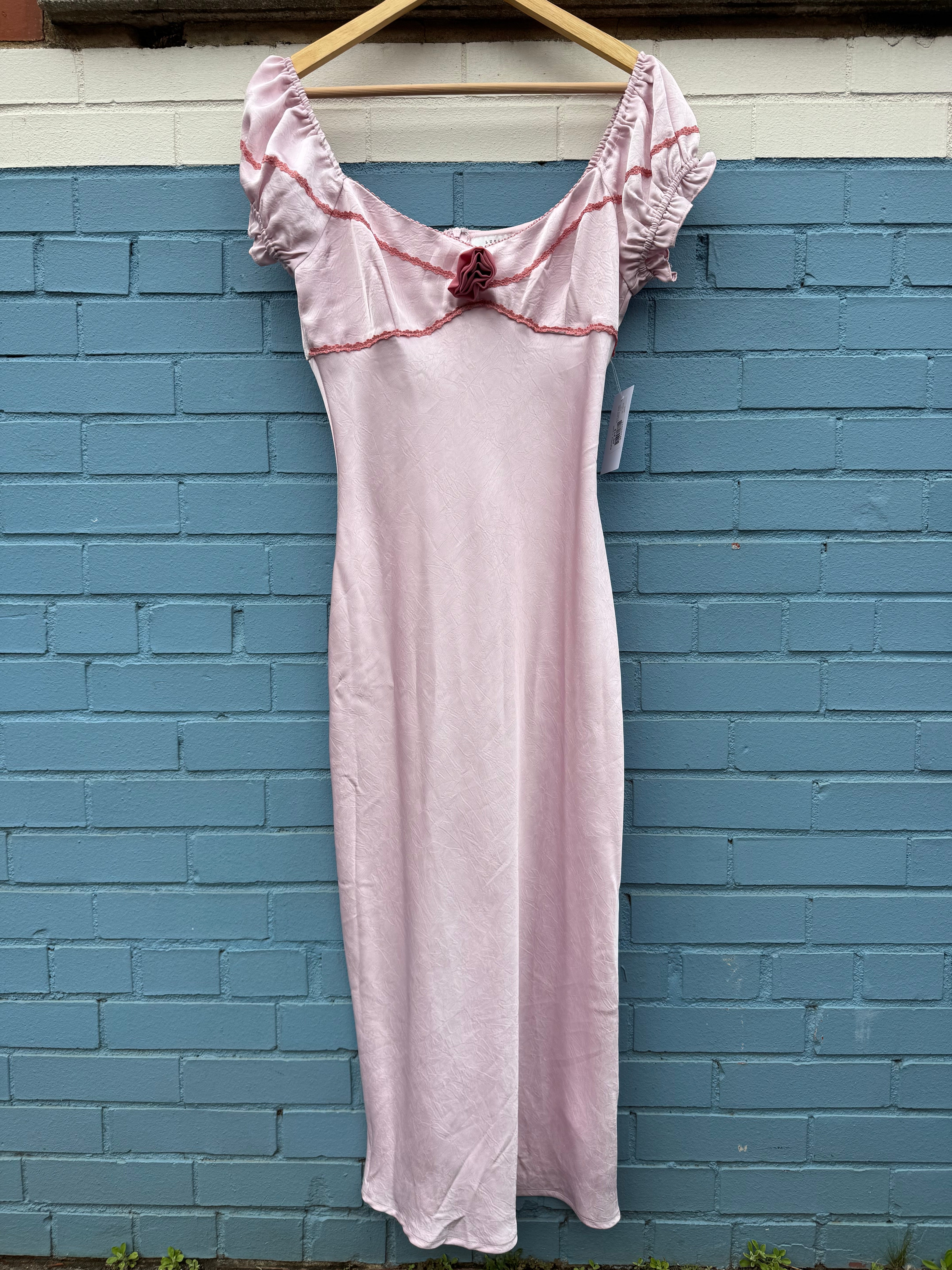 pink lush satin dress w lace trim and rosette, m