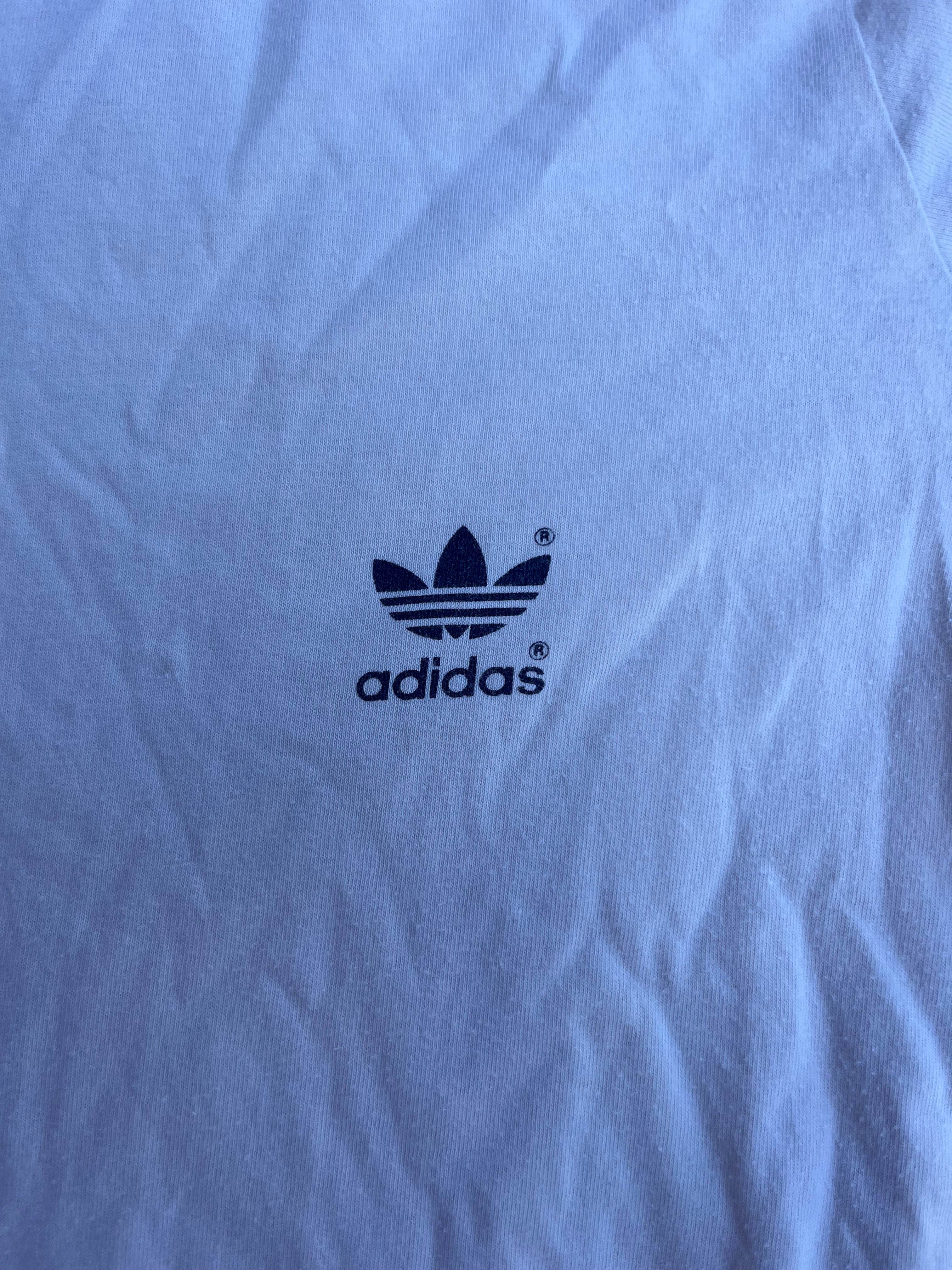 white adidas tee, small