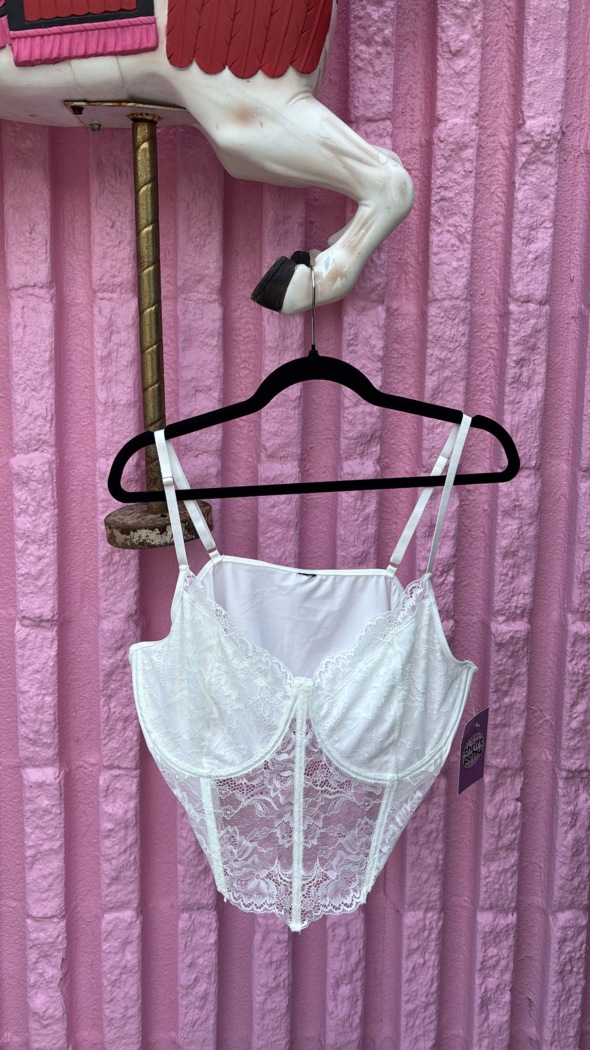 white  lacy corset fits a size XL
