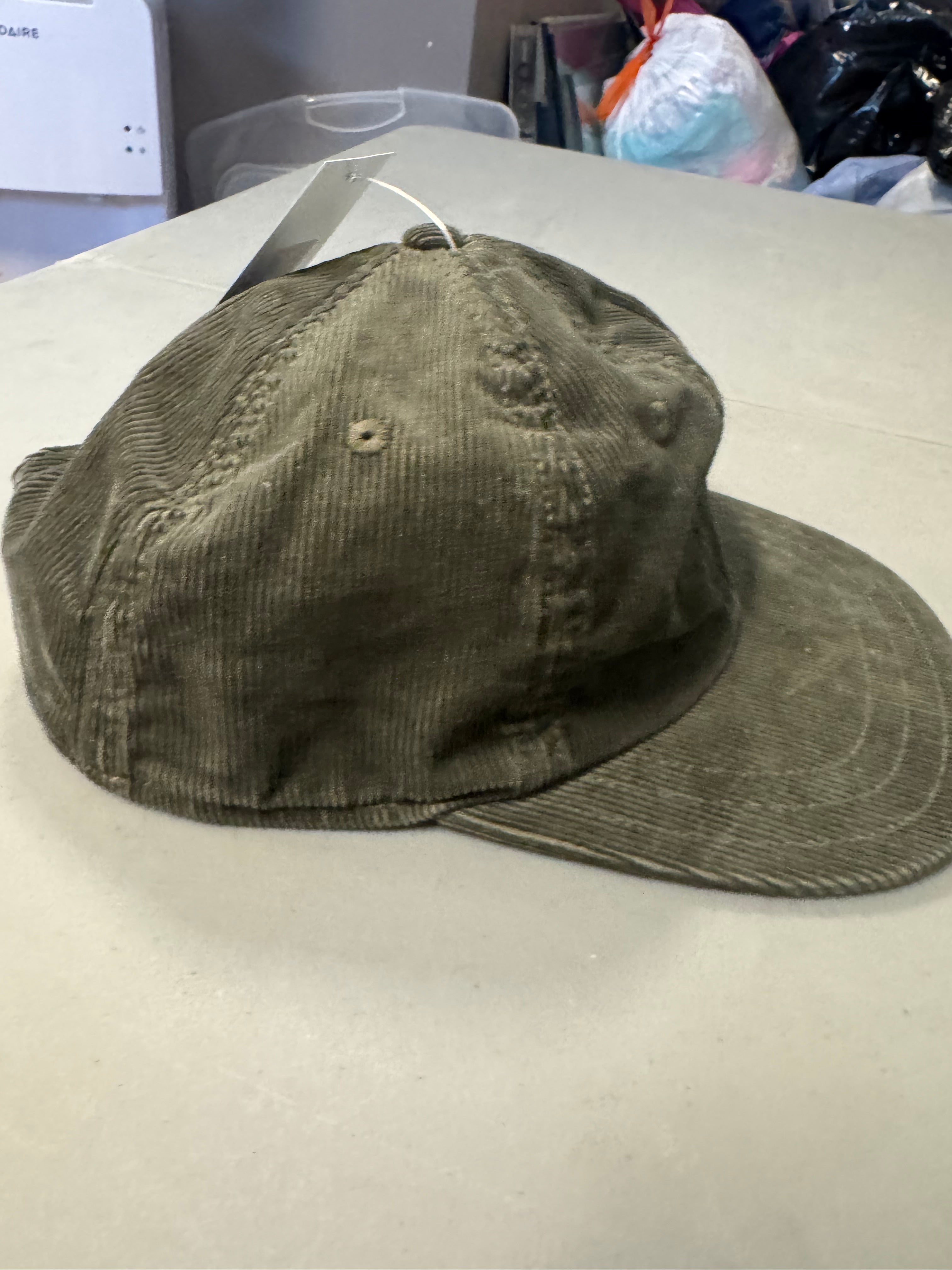 green patagonia cord snapback