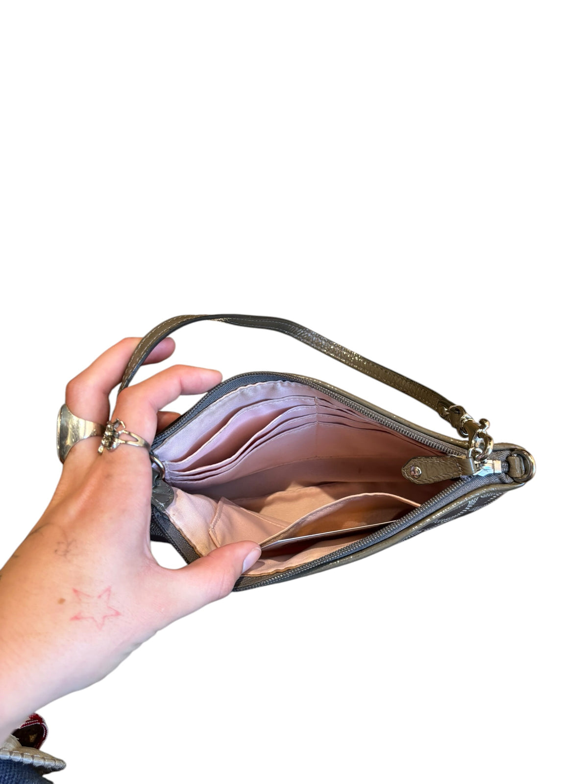 grey coach branded wristlet