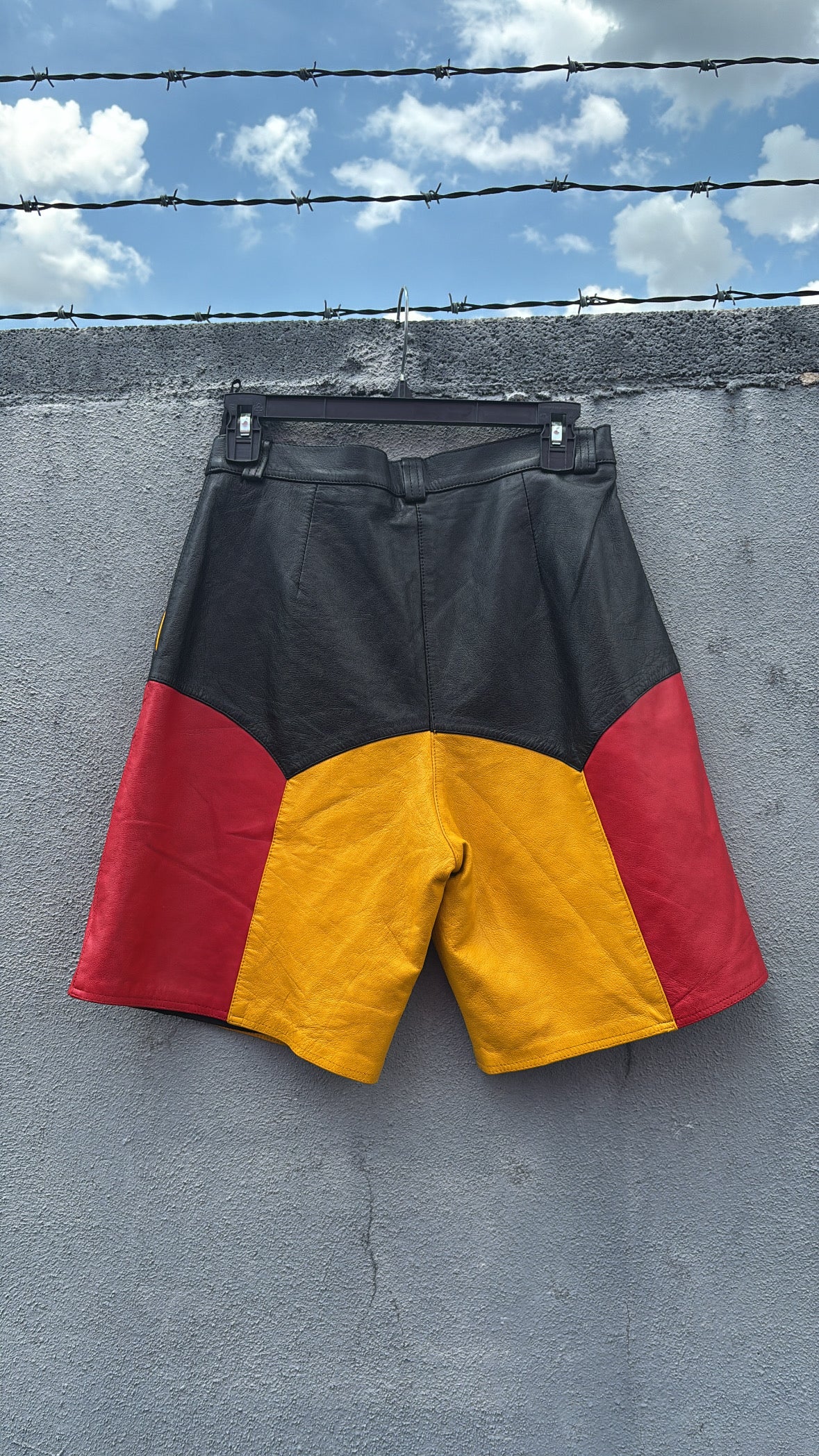 Black red yellow  Vtg leather color block shorts, M