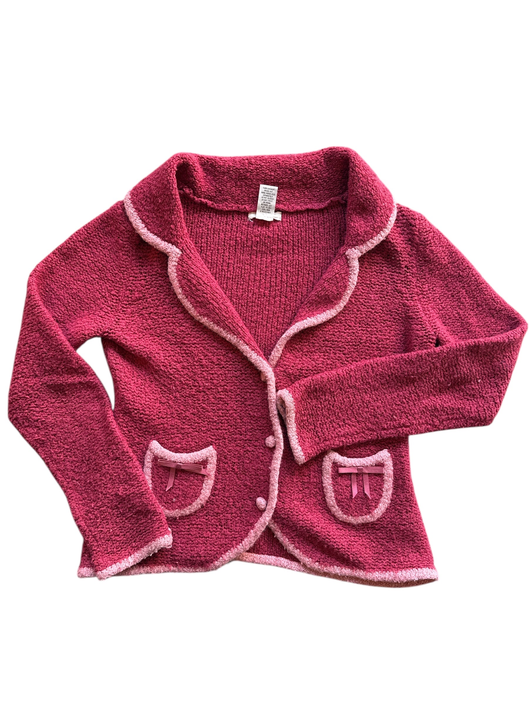 pink sleeping on snow two tone button up sweater, m