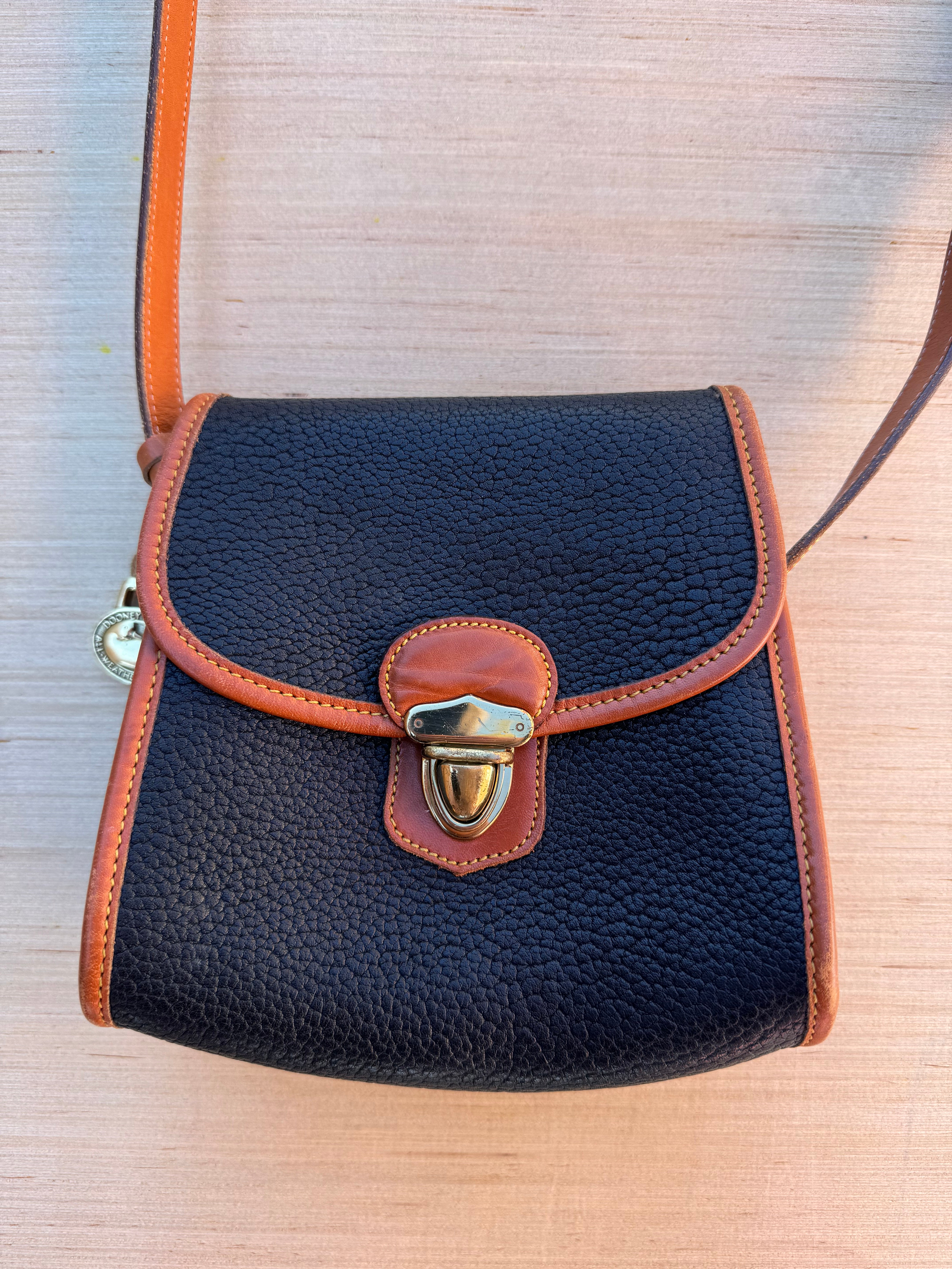 navy brown Dooney & burke crossbody bag