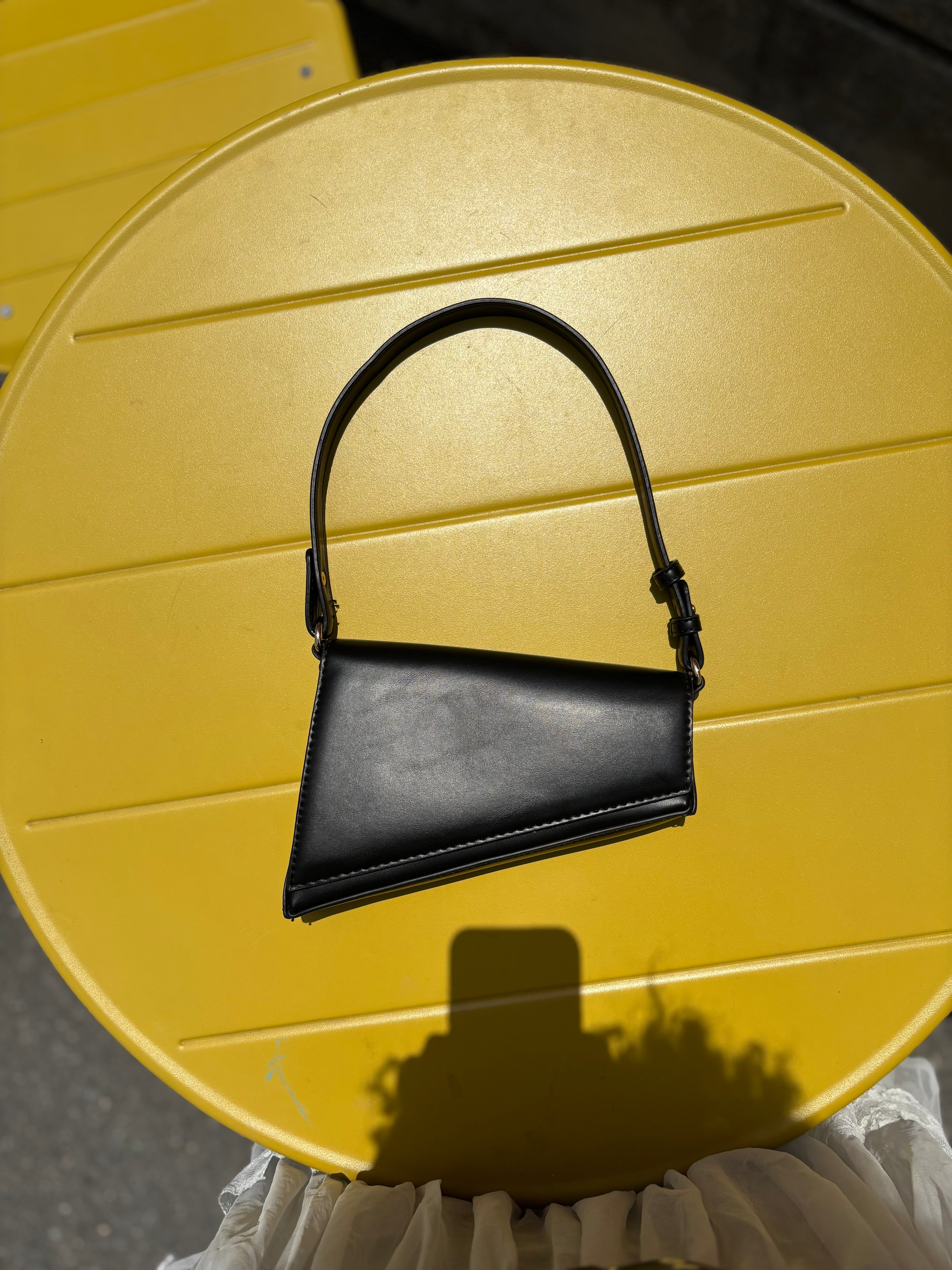 black madison west structured handbag