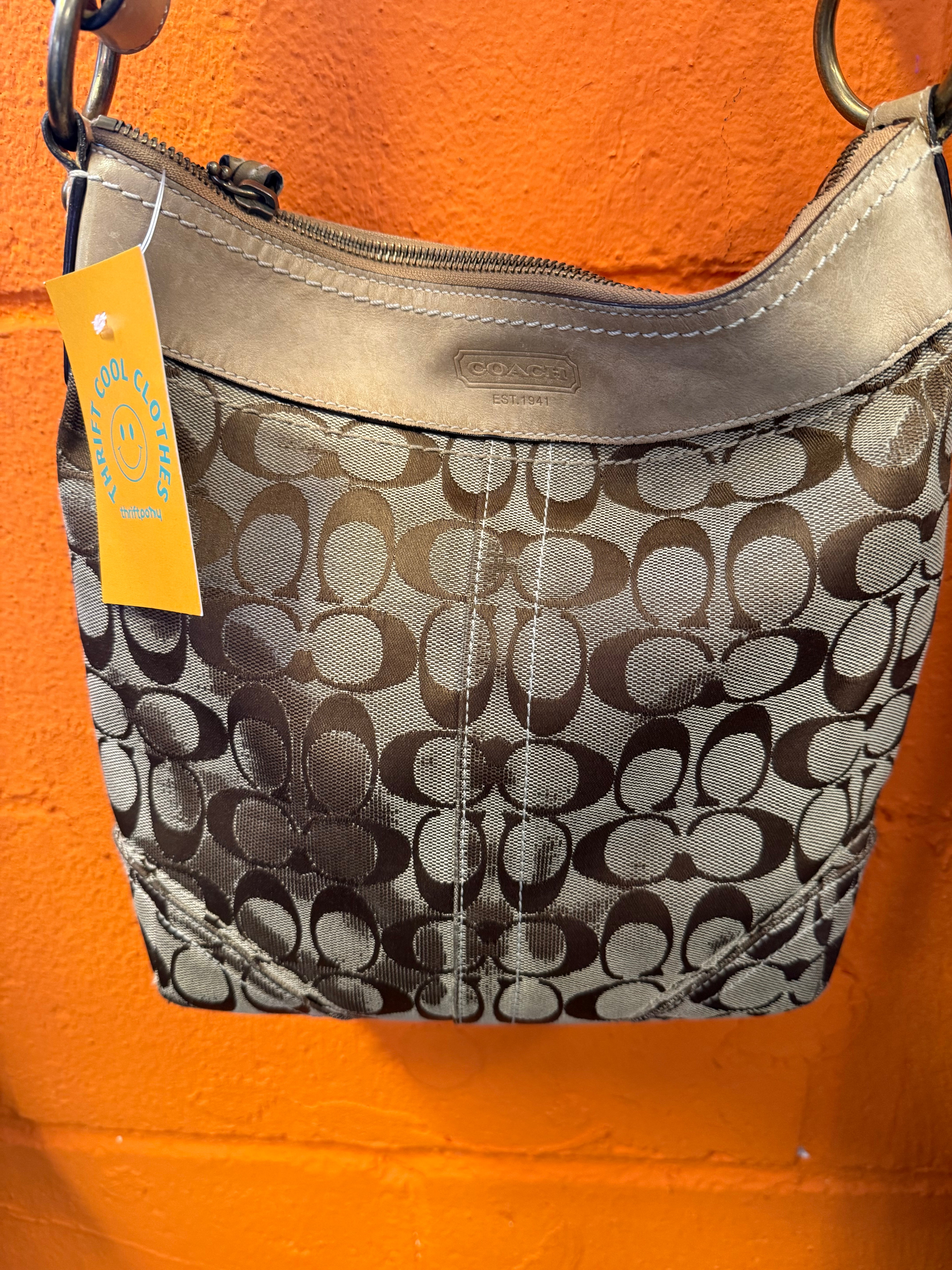brown coach branded crossbody