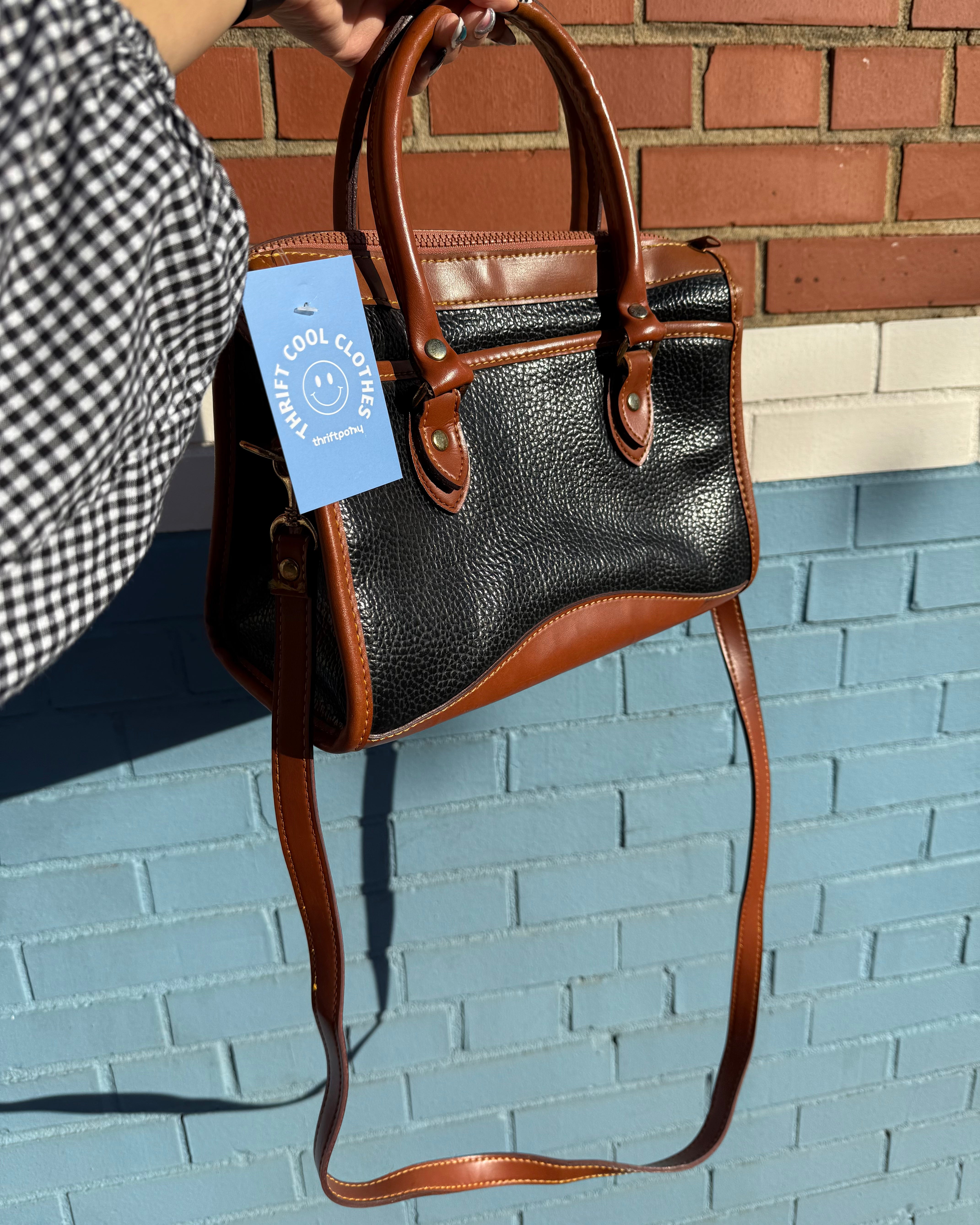 black brown dooney & bourke handbag